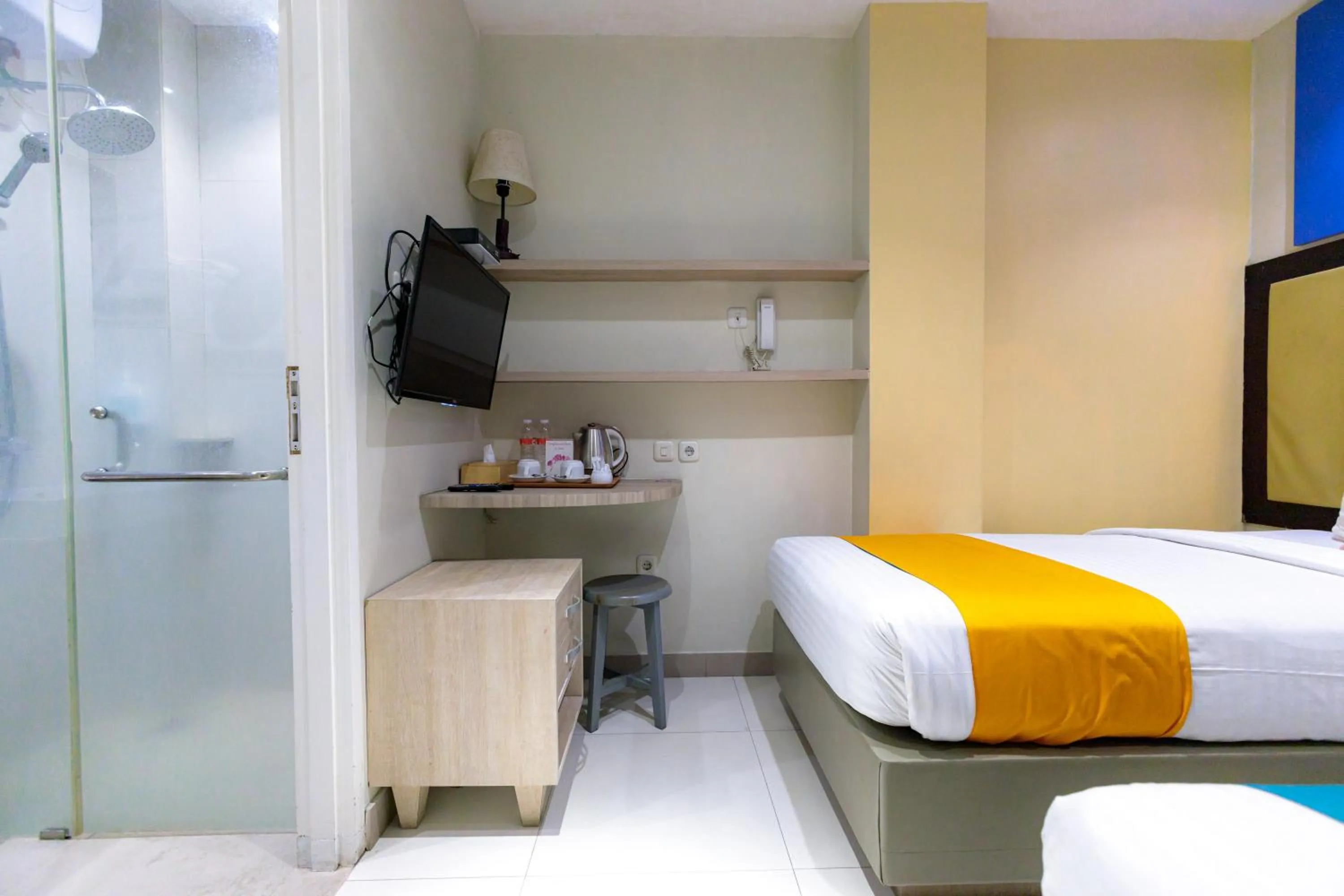 Bedroom, Bed in Sans Hotel Liv Ancol by RedDoorz