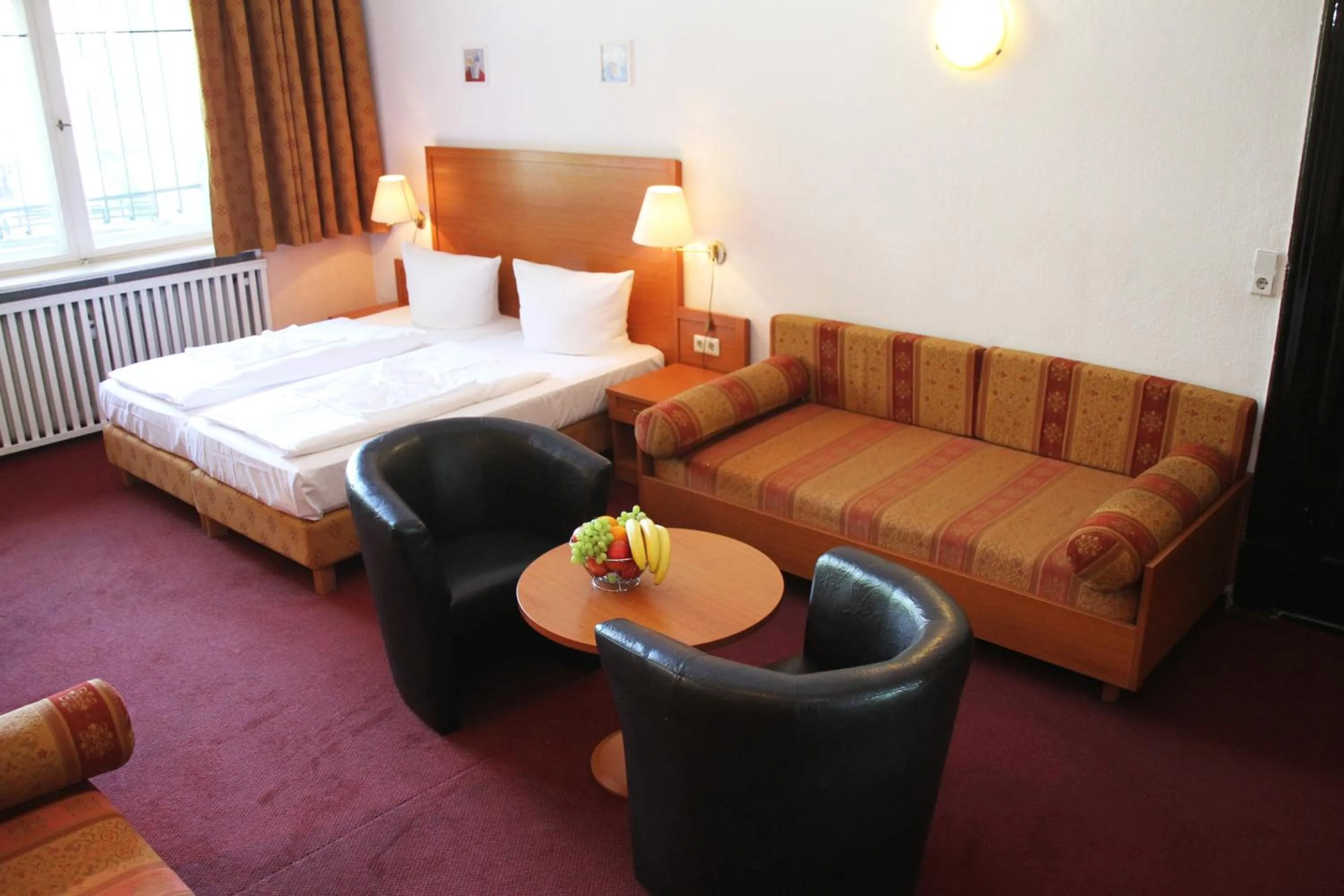 Photo of the whole room, Bed in Hotel Aster an der Messe