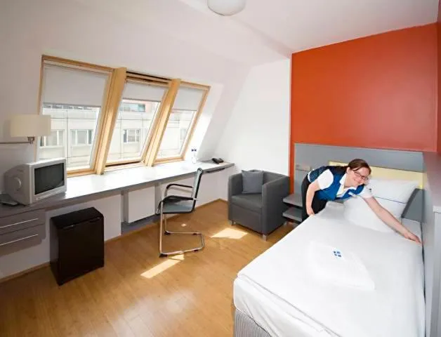 Bed in Dietrich-Bonhoeffer-Hotel Berlin Mitte