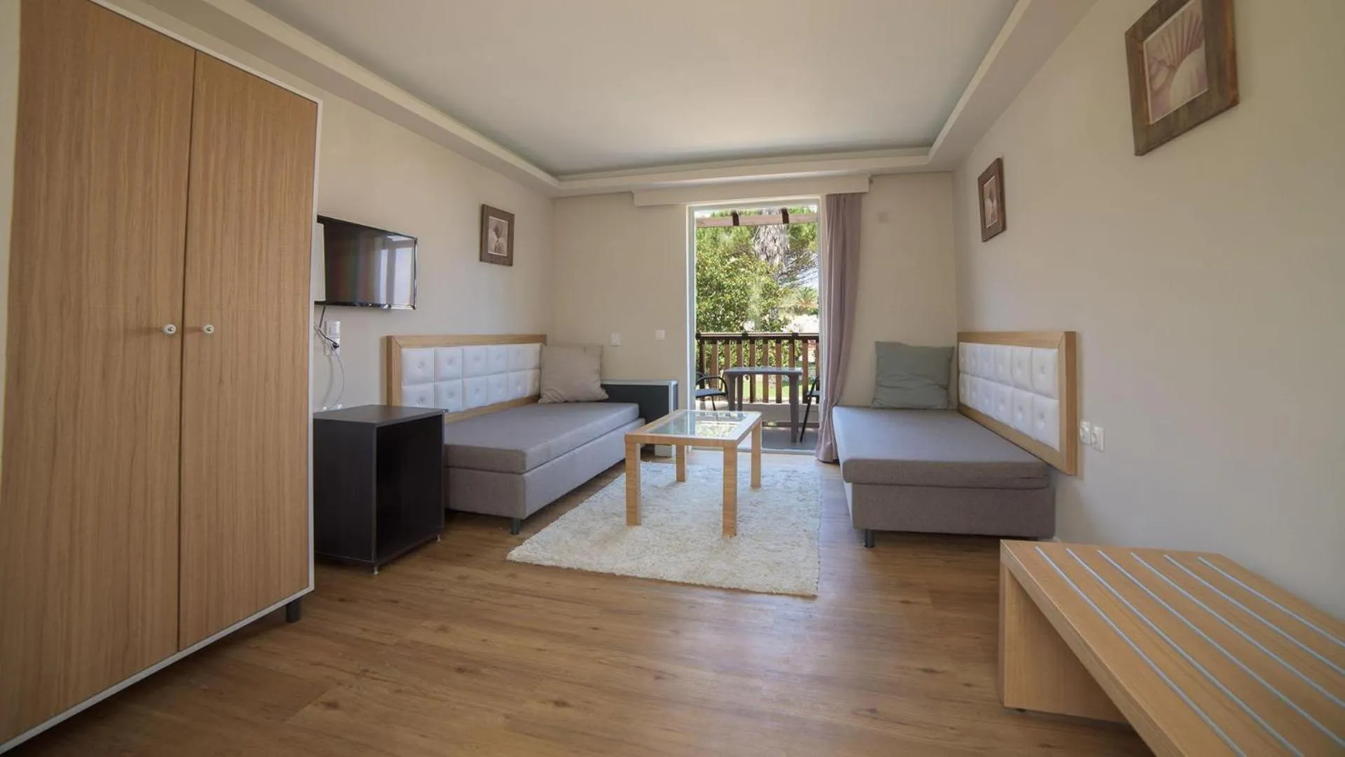 Photo of the whole room, Bed in Akron Seascape Resort