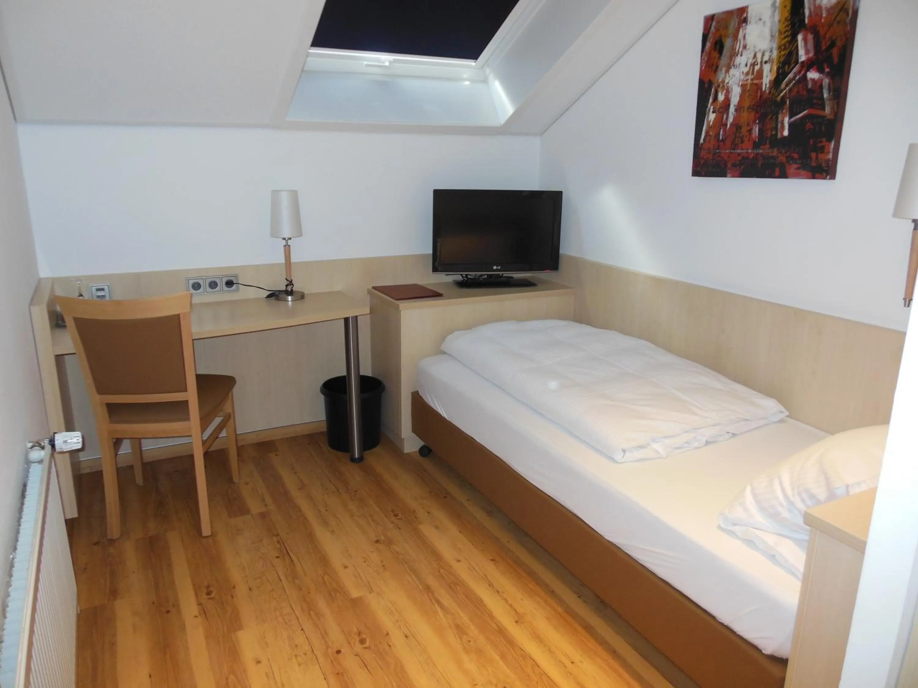 Photo of the whole room, Bed in Hotel & Restaurant Zum Ochsen -Ox Distillery