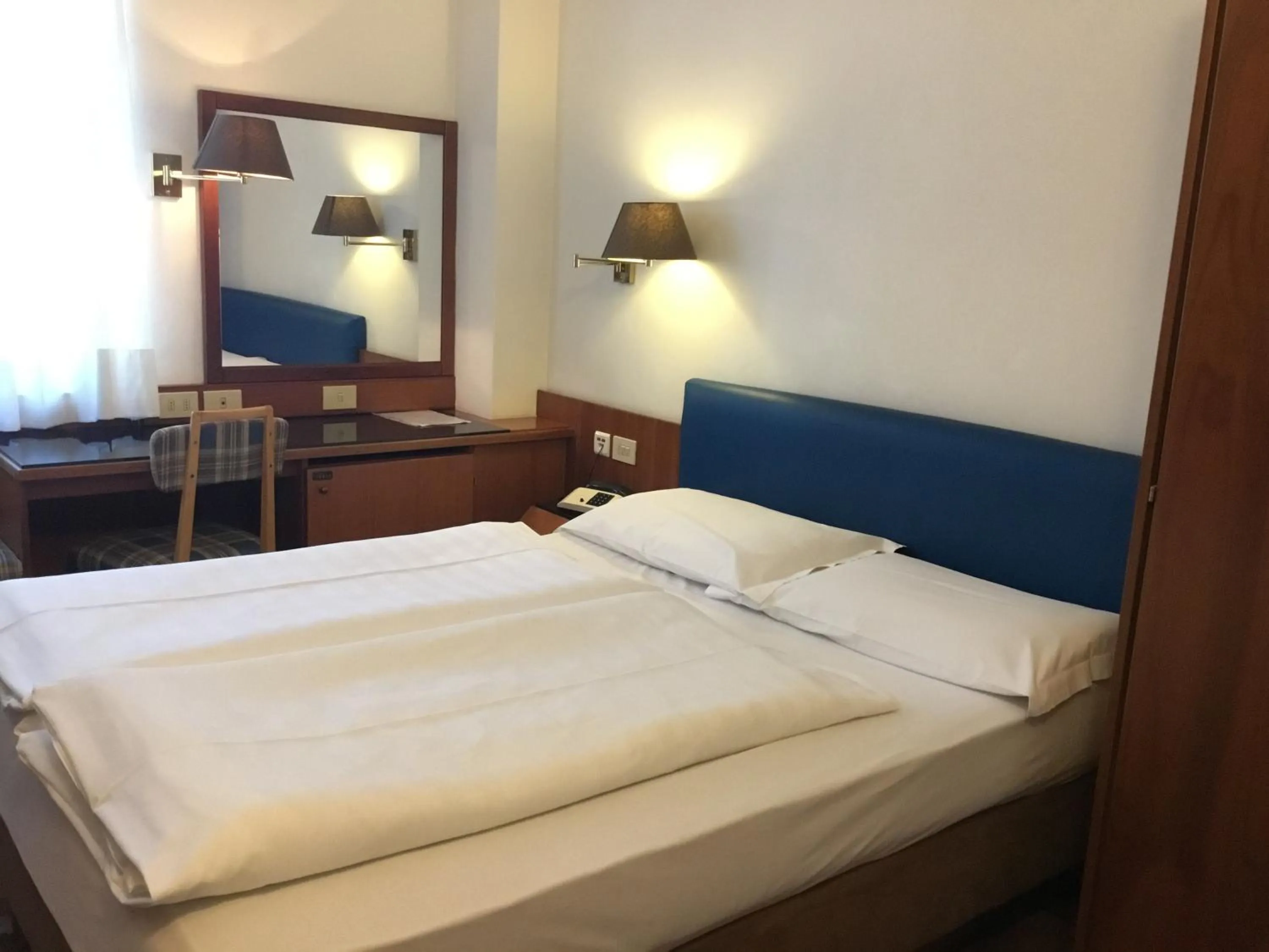 Bed in Hotel Adria
