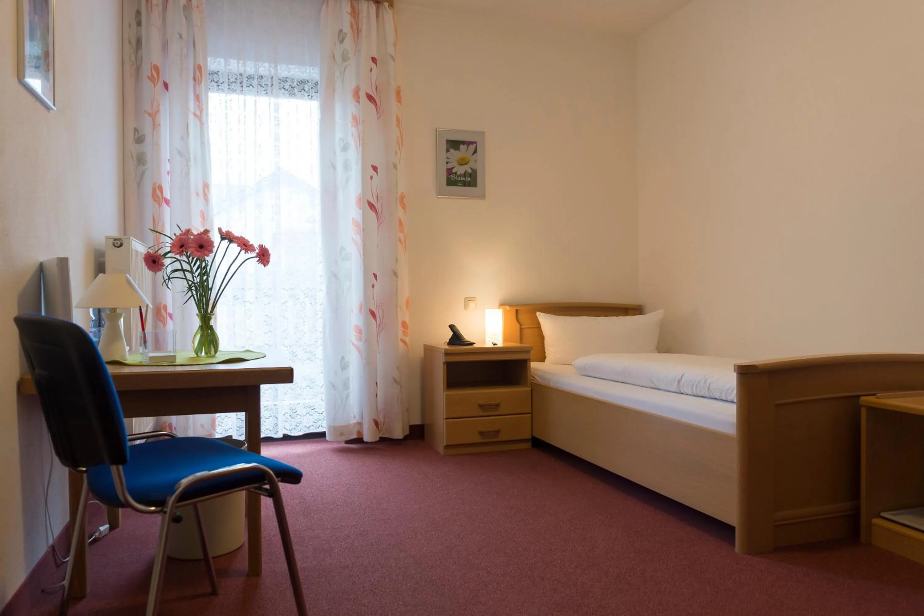 Photo of the whole room, Bed in Hotel Dreisonnenberg