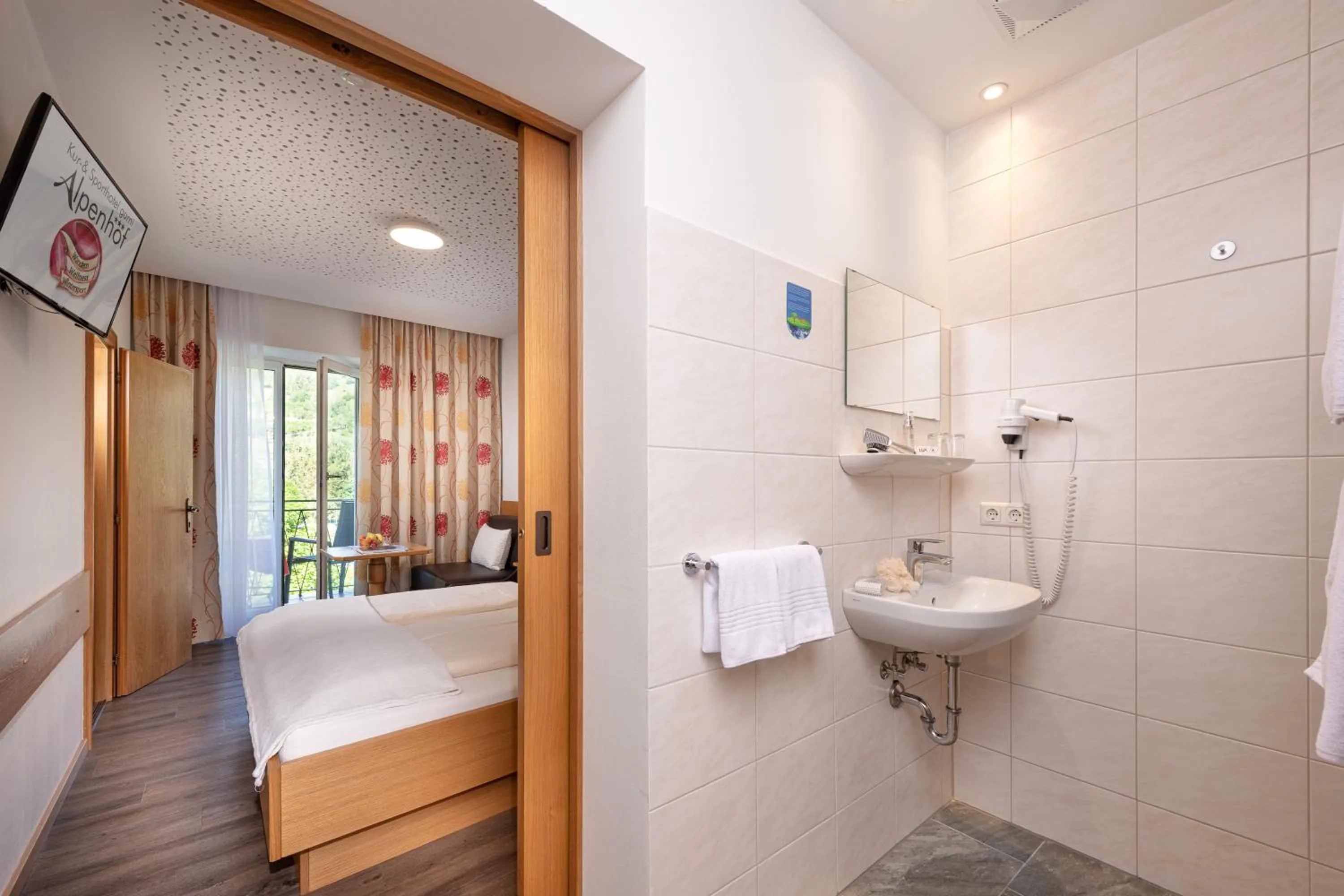 Photo of the whole room, Bed in Hotel Alpenhof - New Sauna Area