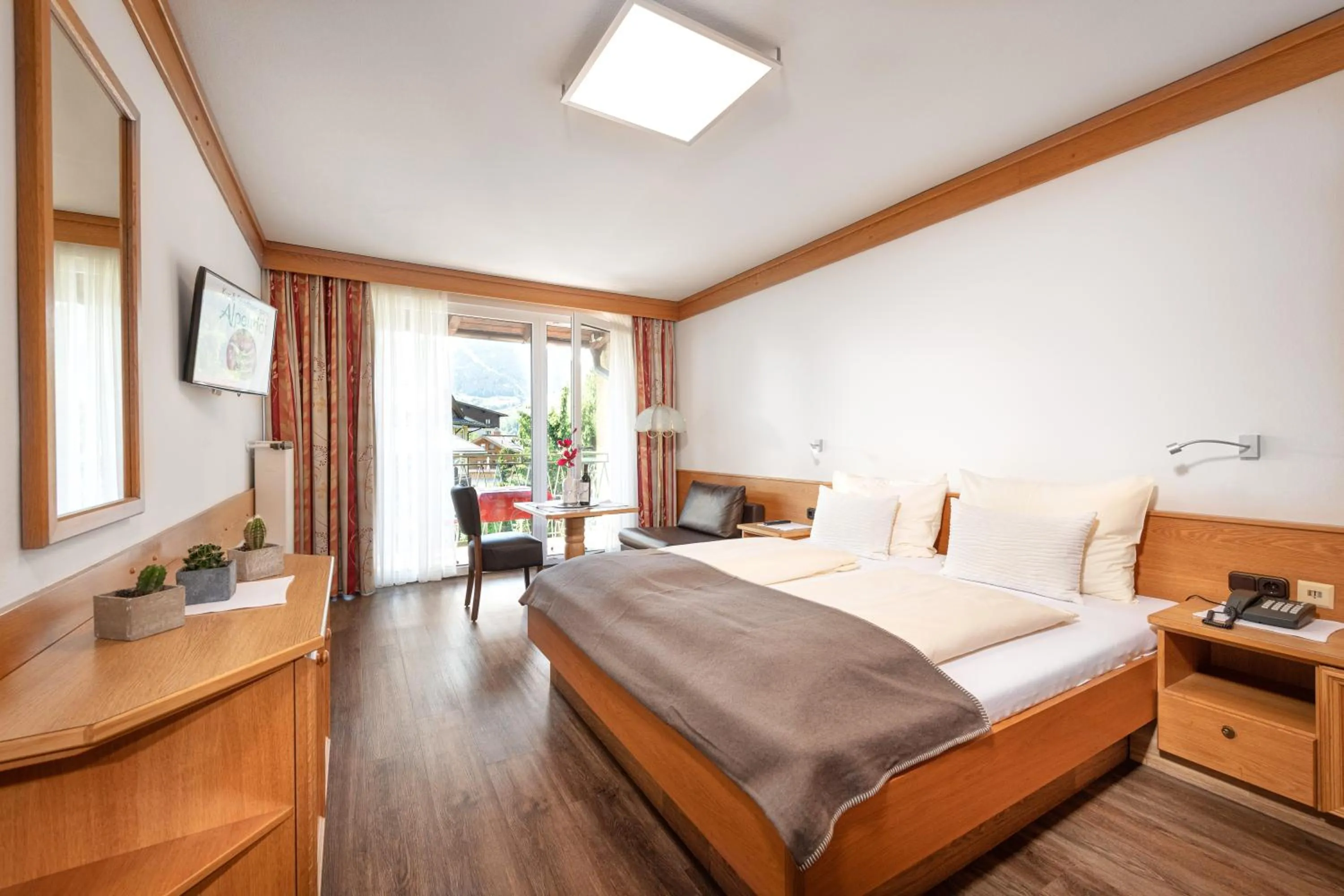 Photo of the whole room, Bed in Hotel Alpenhof - New Sauna Area