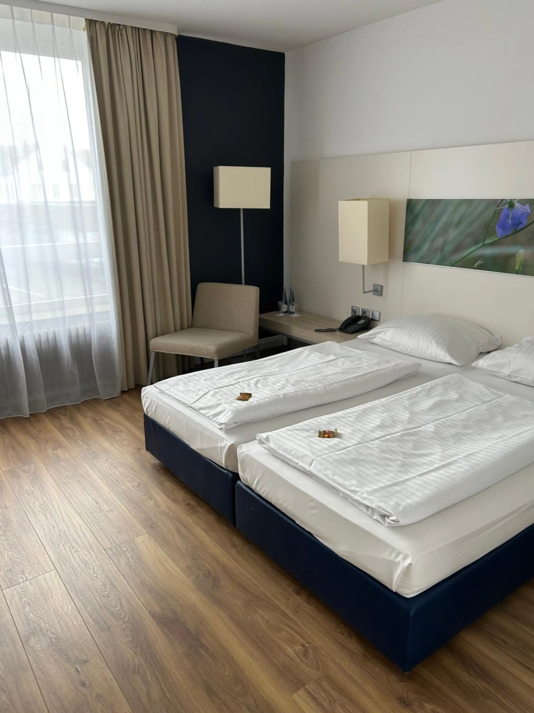 Photo of the whole room, Bed in Concorde Hotel Siegen