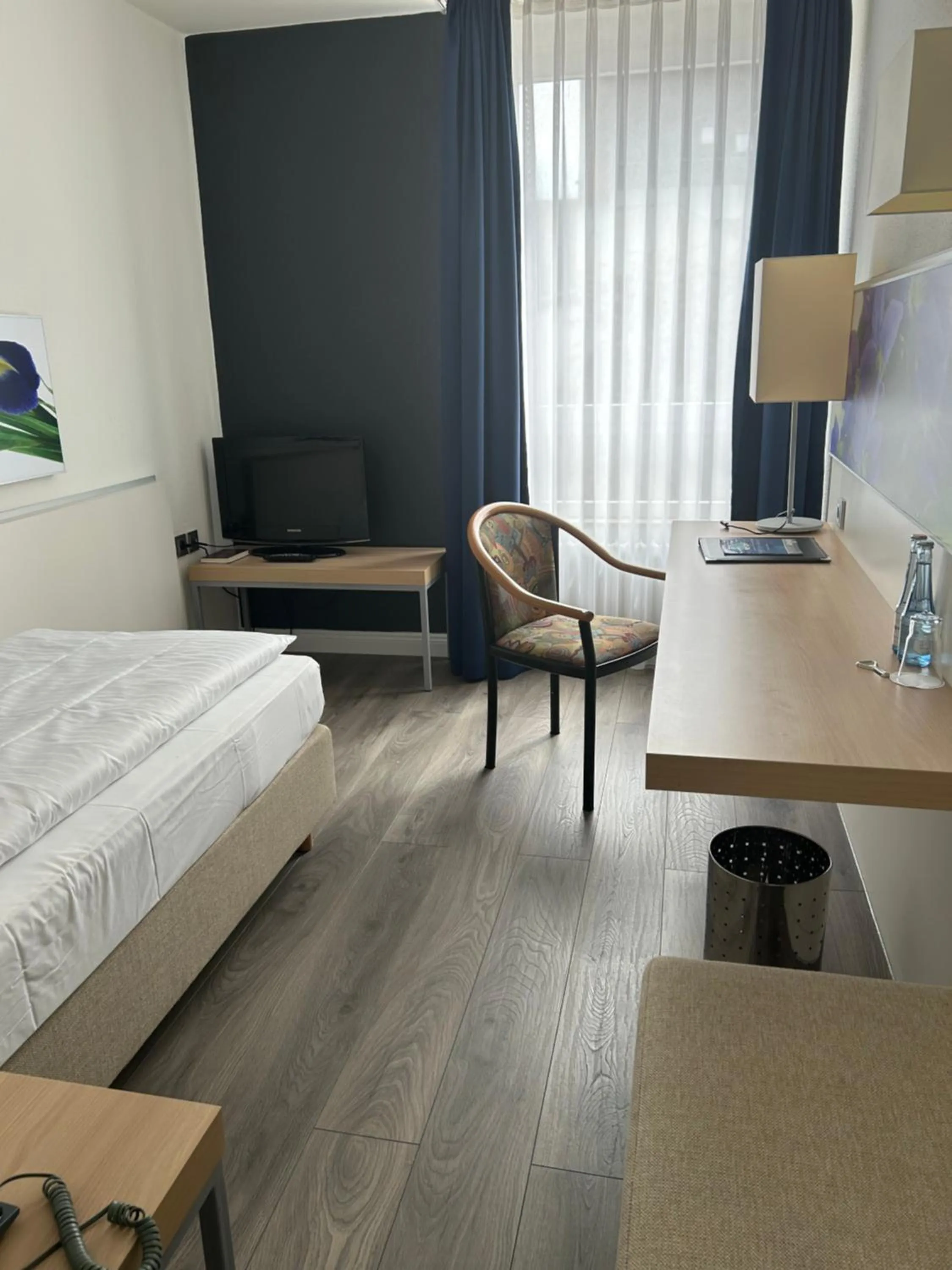 Photo of the whole room, Bed in Concorde Hotel Siegen