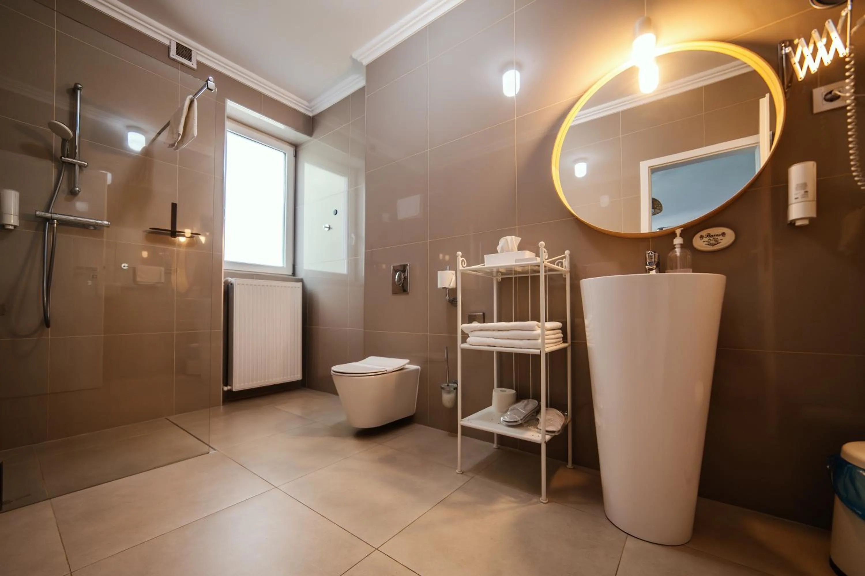 Bathroom in compleX living aparthotel