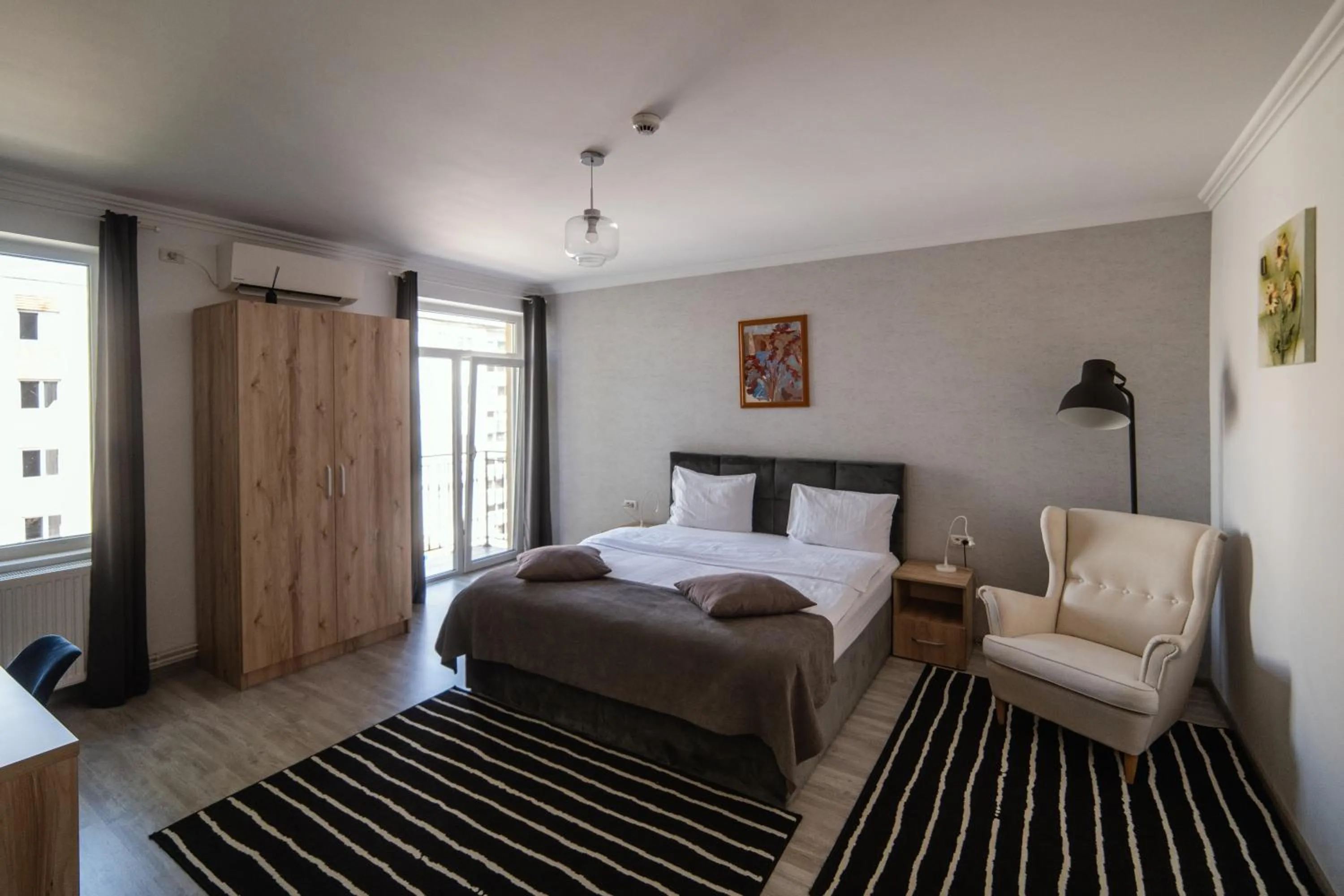 Living room, Bed in compleX living aparthotel