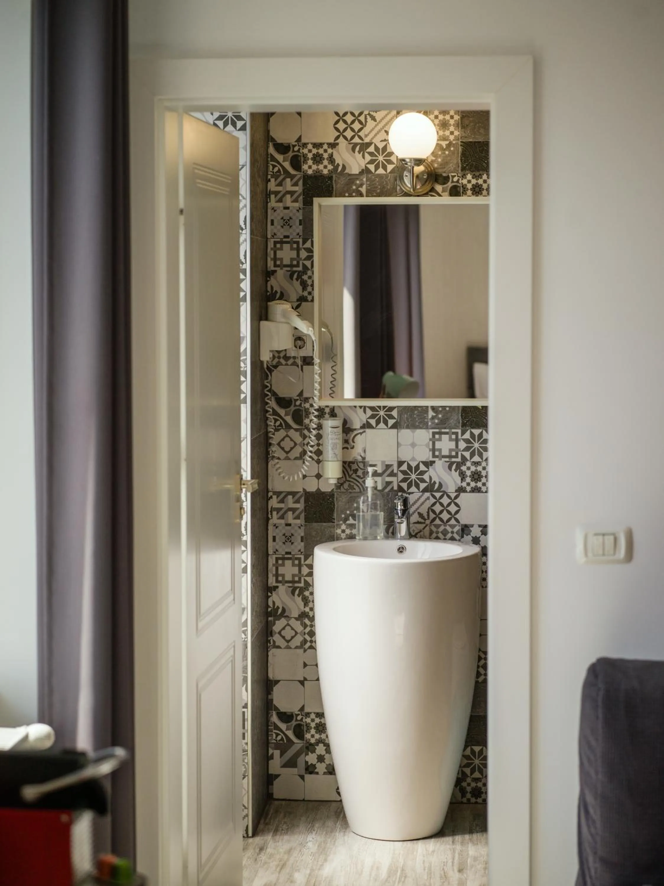 Toilet in compleX living aparthotel