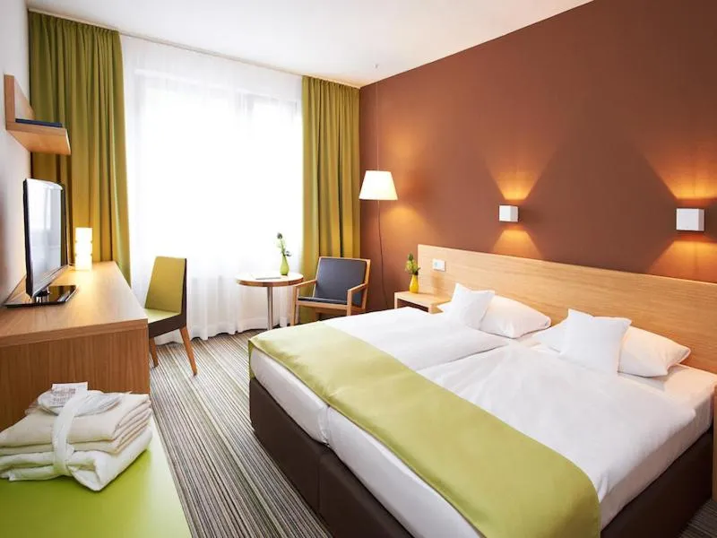 Photo of the whole room, Bed in Hotel Zugbrücke Grenzau GmbH