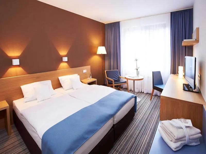 Photo of the whole room, Bed in Hotel Zugbrücke Grenzau GmbH