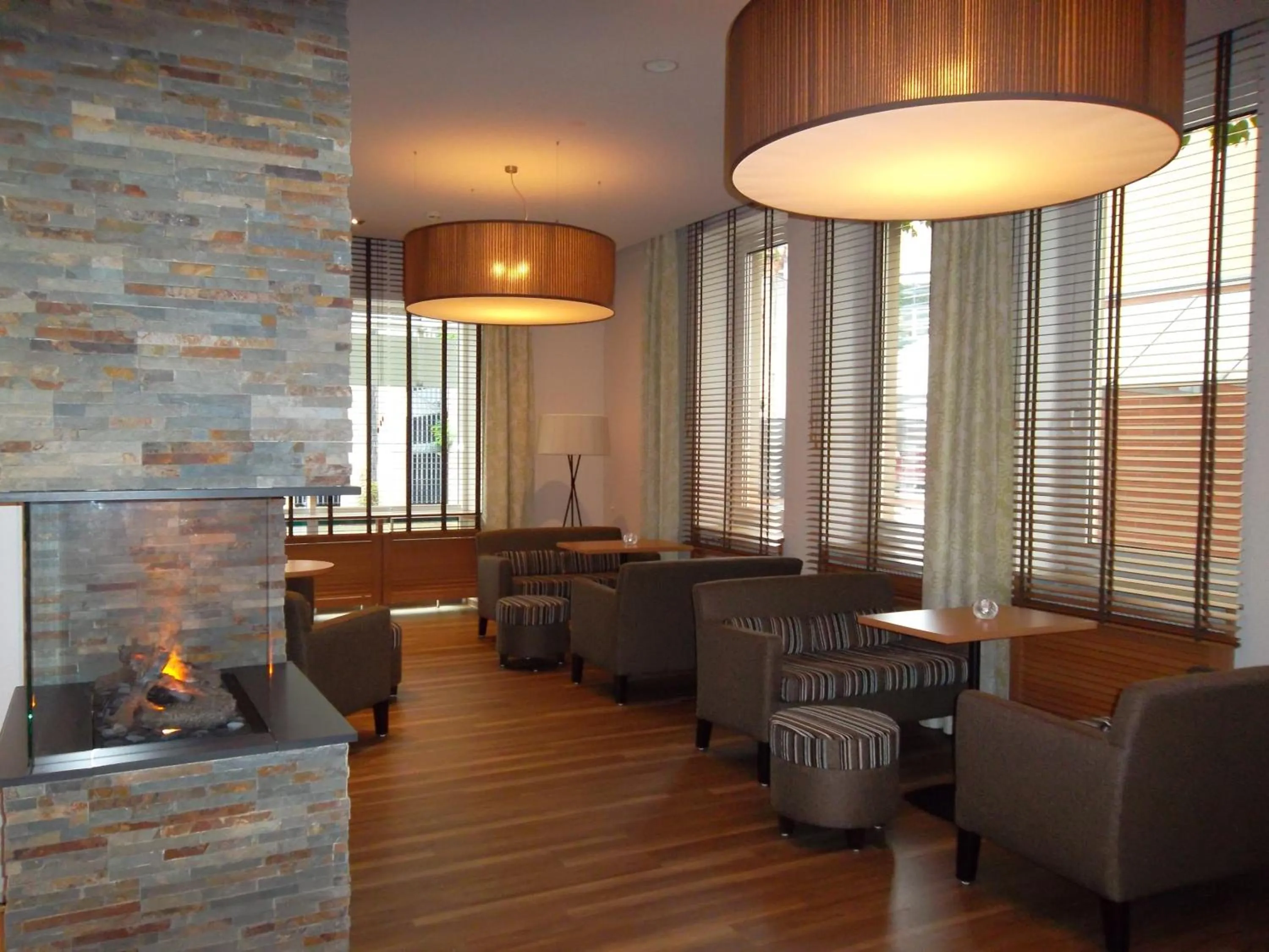 Communal lounge/ TV room in Akzent Hotel Köhler