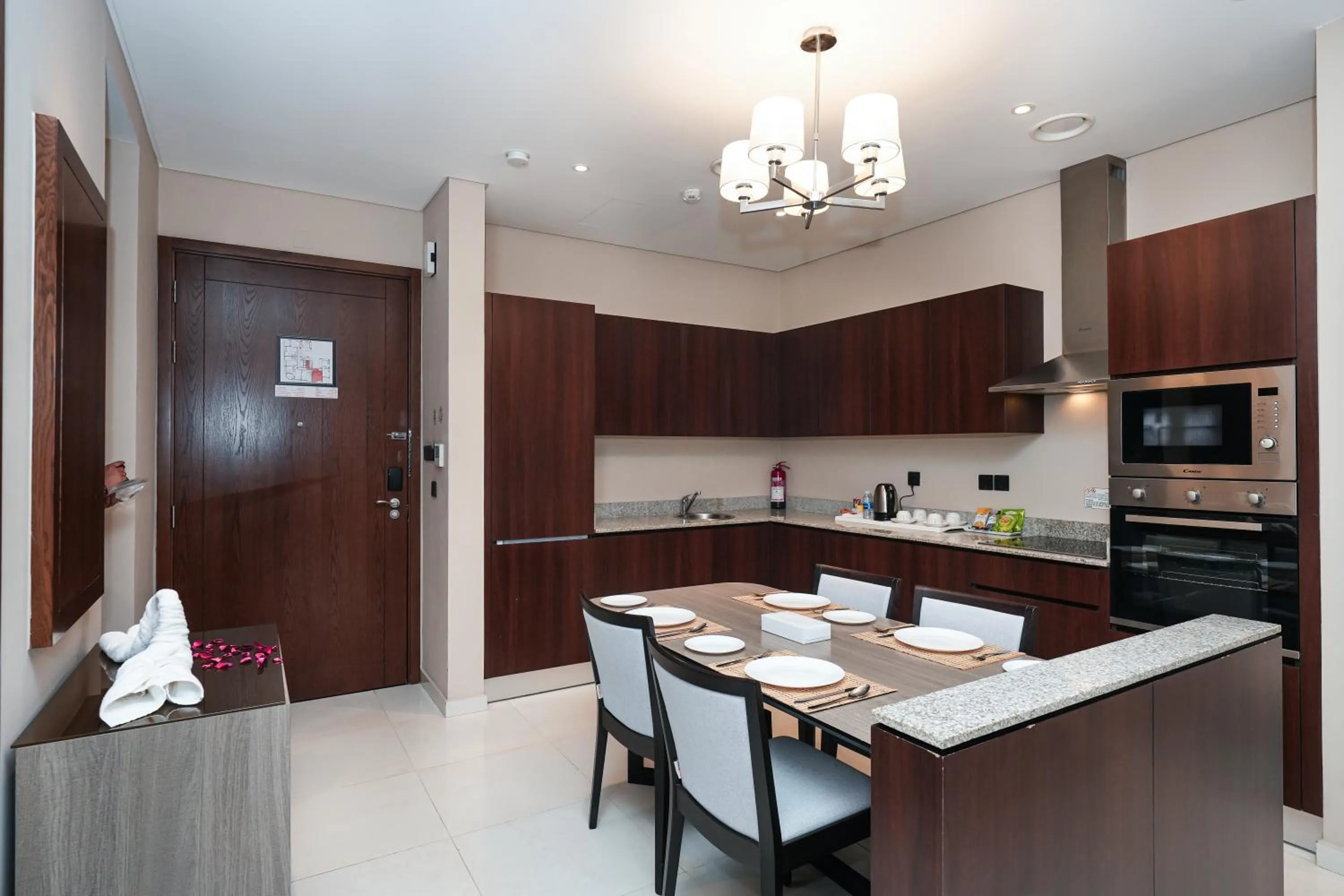 Kitchen or kitchenette in Eden Garden Hotel Apartment