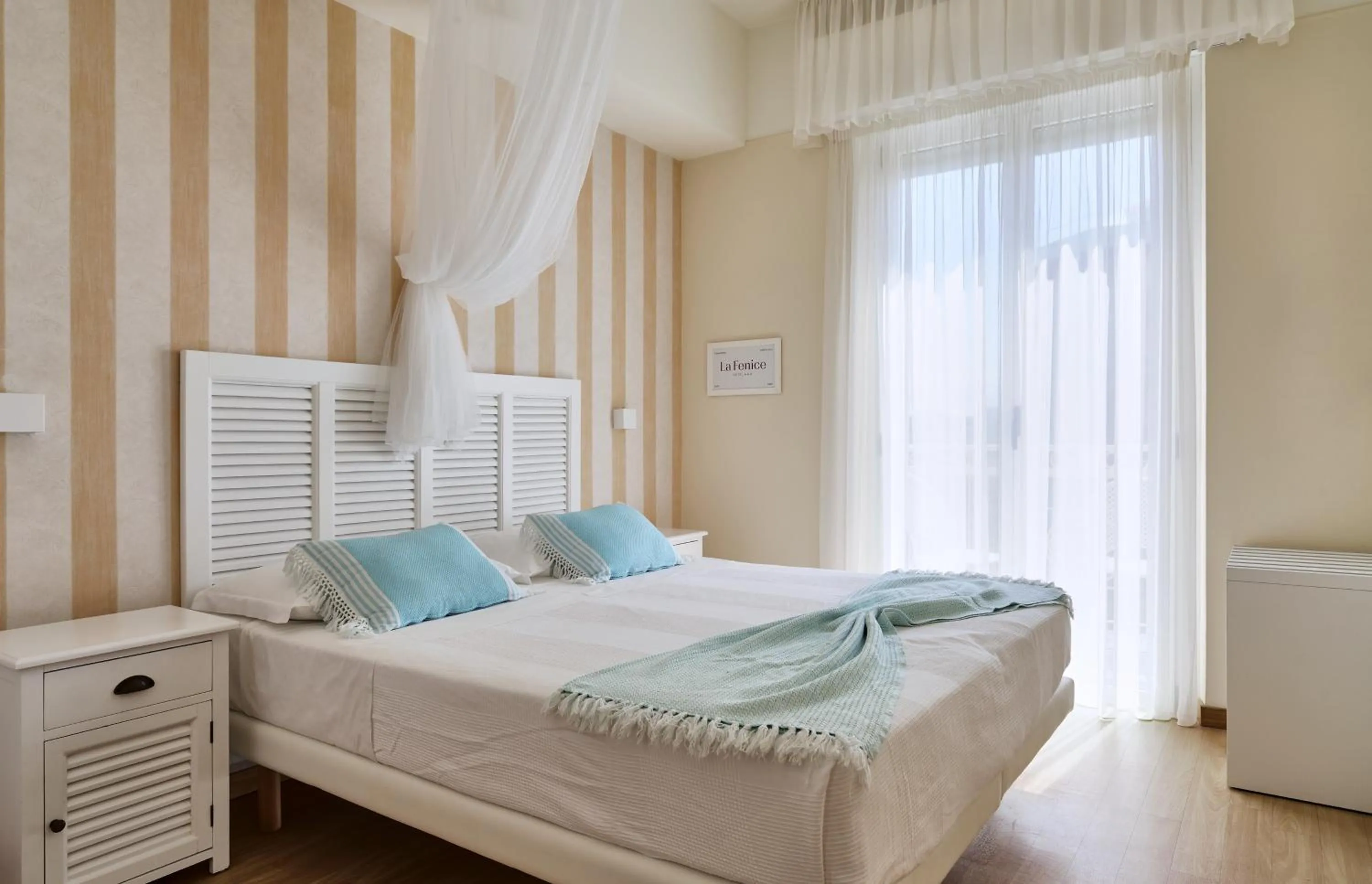 Bed in Hotel La Fenice