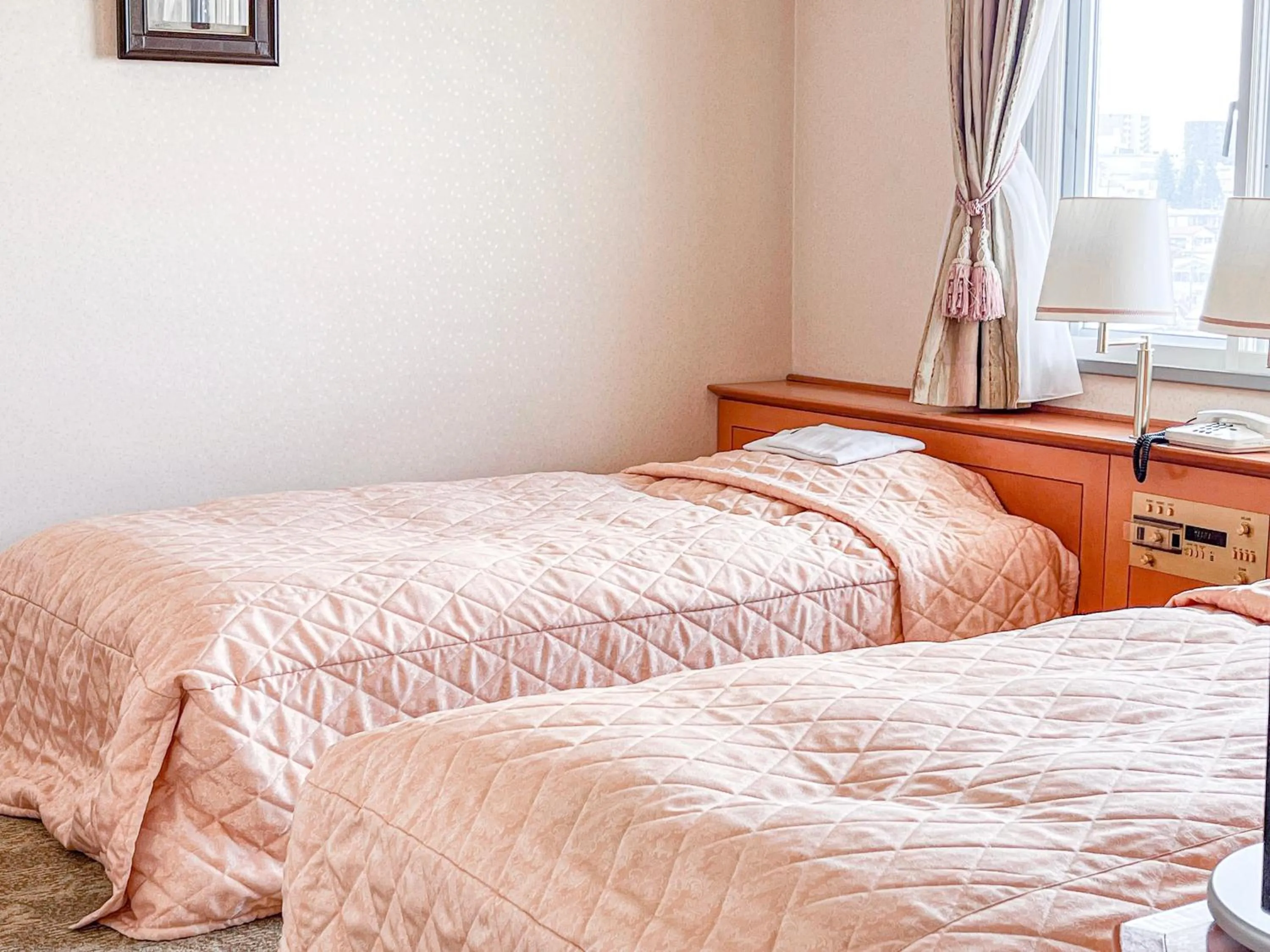 Bed in Hachinohe Plaza Hotel