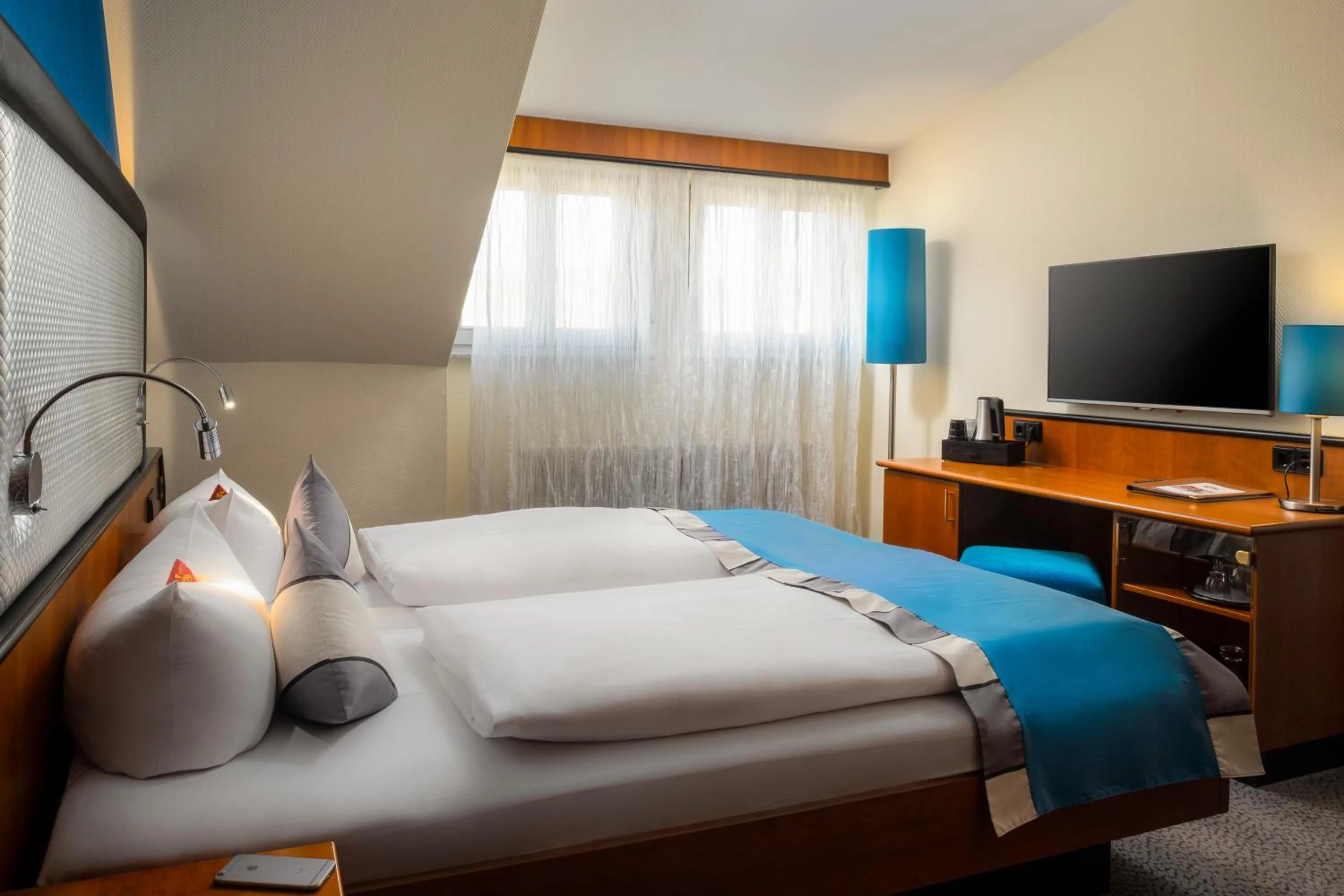 Bed in Hetzel Hotel Stuttgart