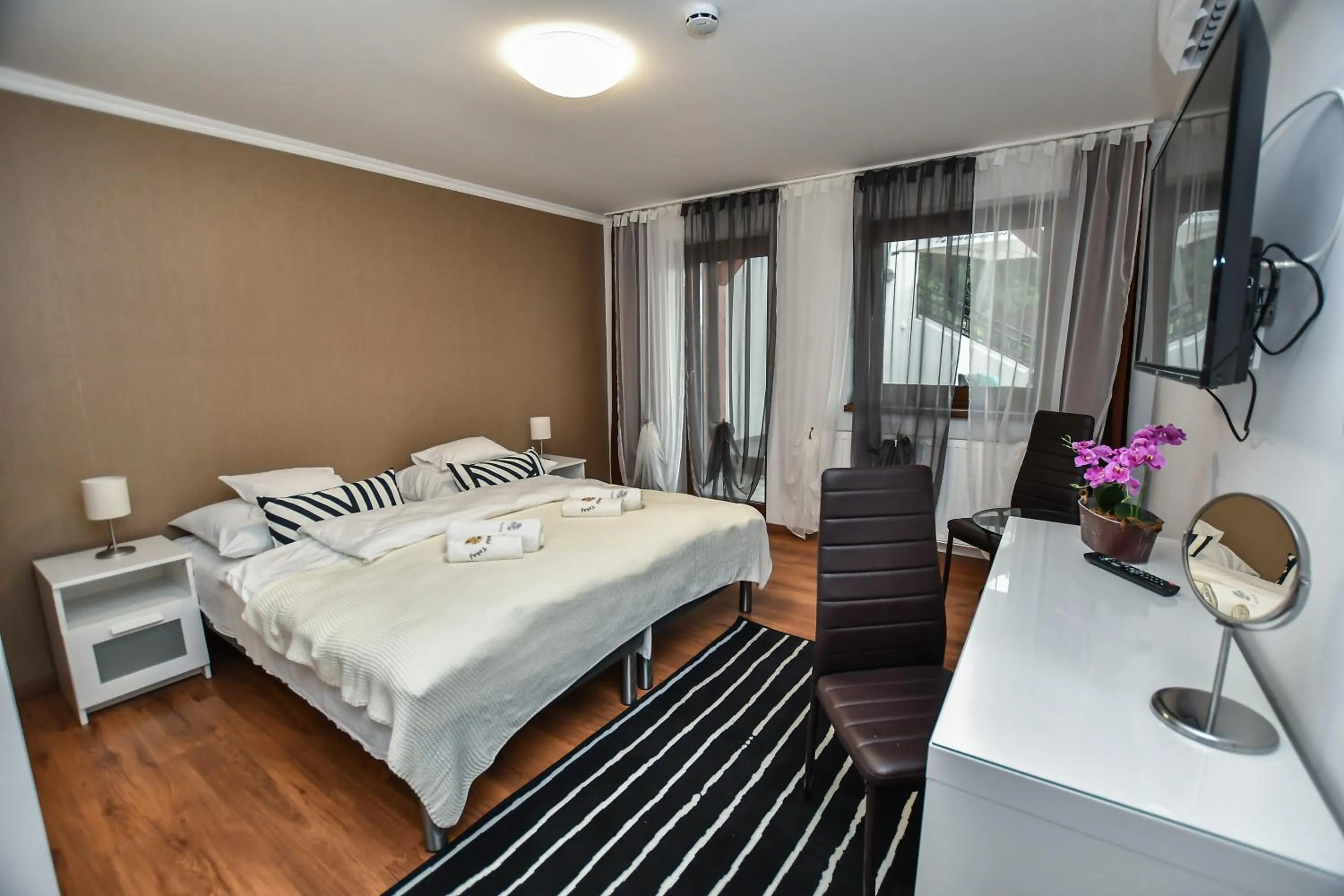 Photo of the whole room, Bed in É-Vaskó Panzió Borpince