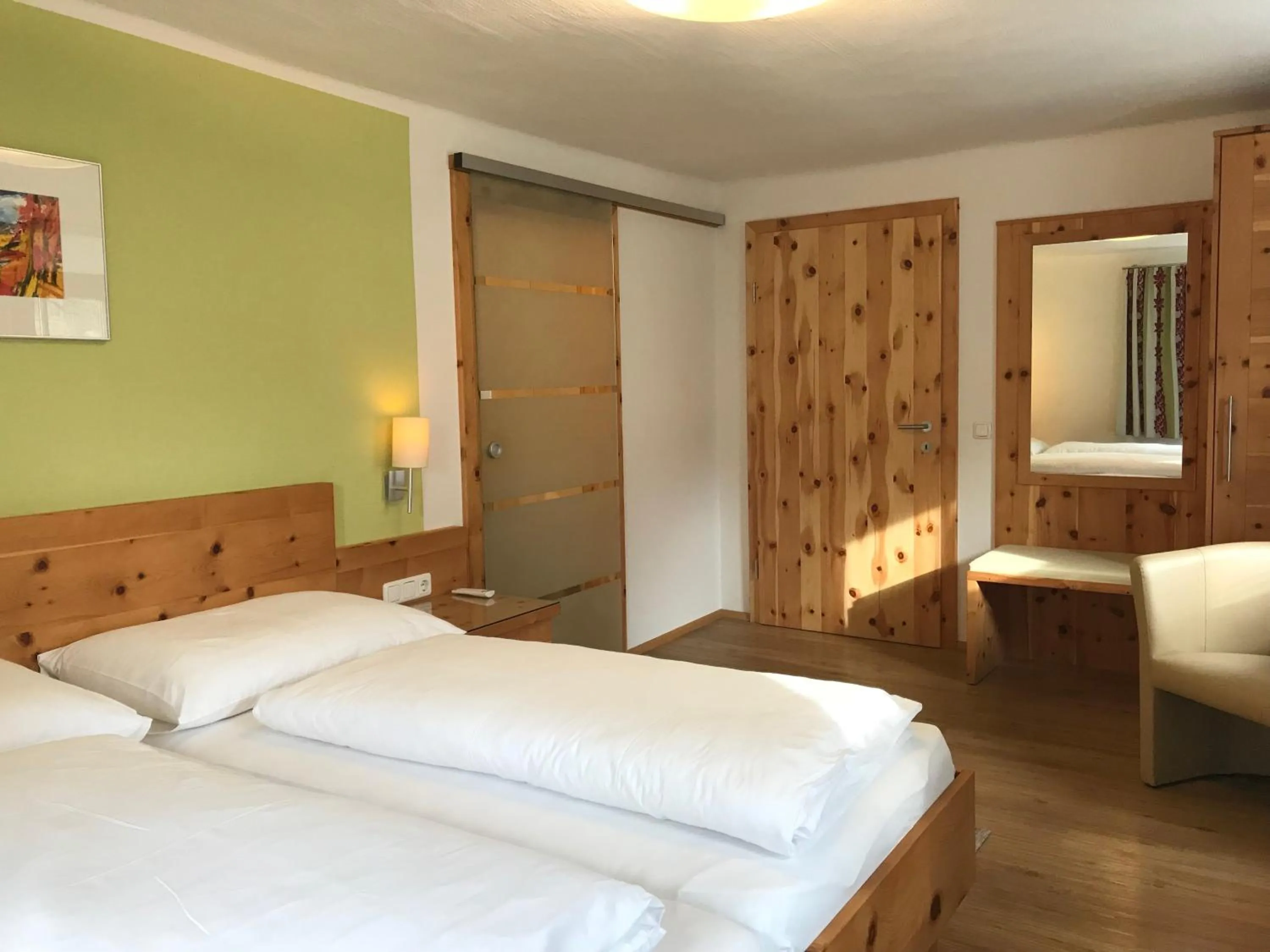 Bed in Gasthof Hotel Andlwirt