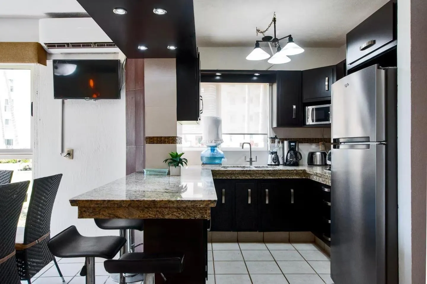 Kitchen or kitchenette in Marina Suites by Andiani Travel