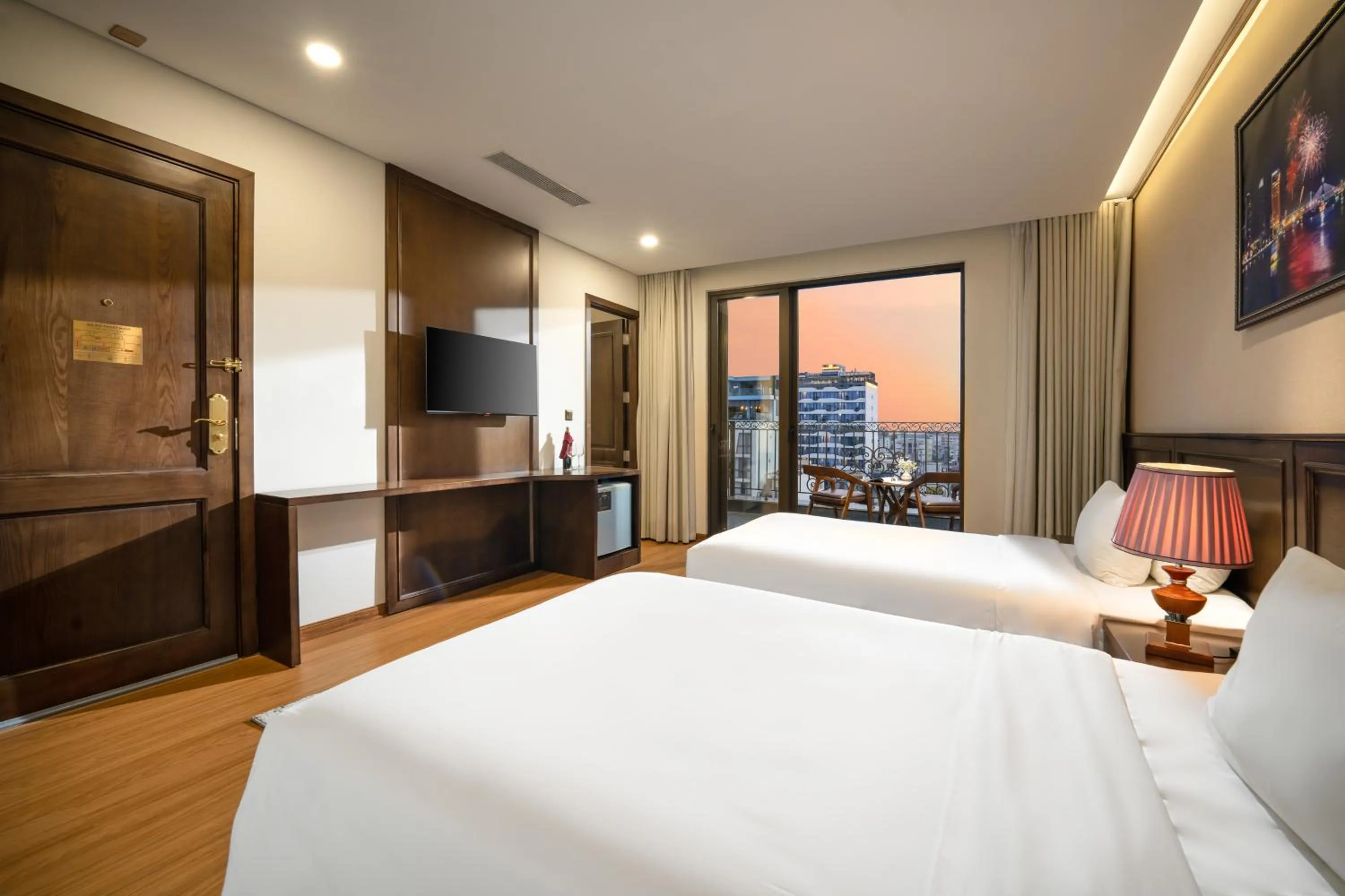 Bed in Golden Lotus Hotel Da Nang - Rooftop Bar Sea View