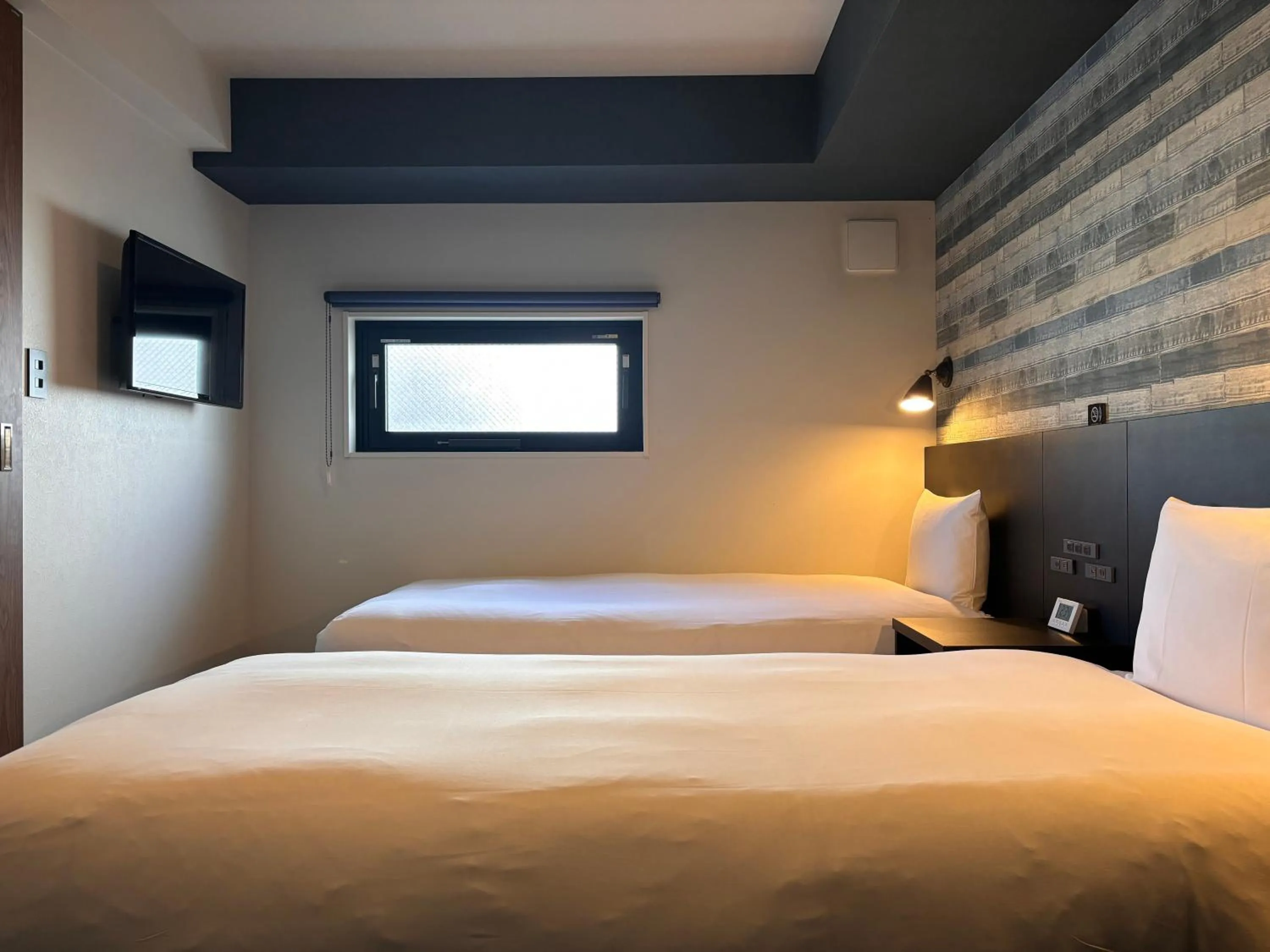 Bed in HOTEL TABARD TOKYO