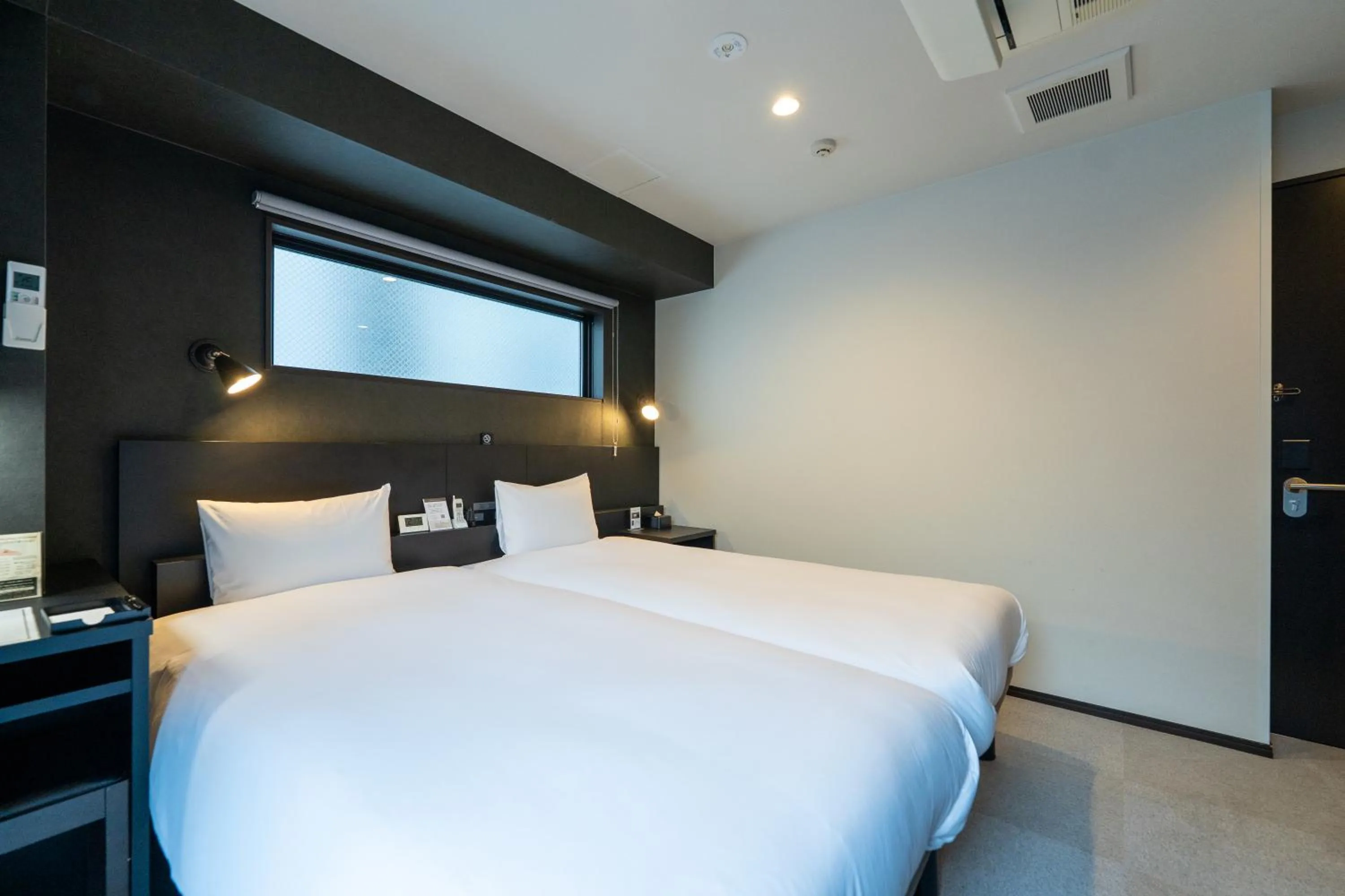 Bed in HOTEL TABARD TOKYO