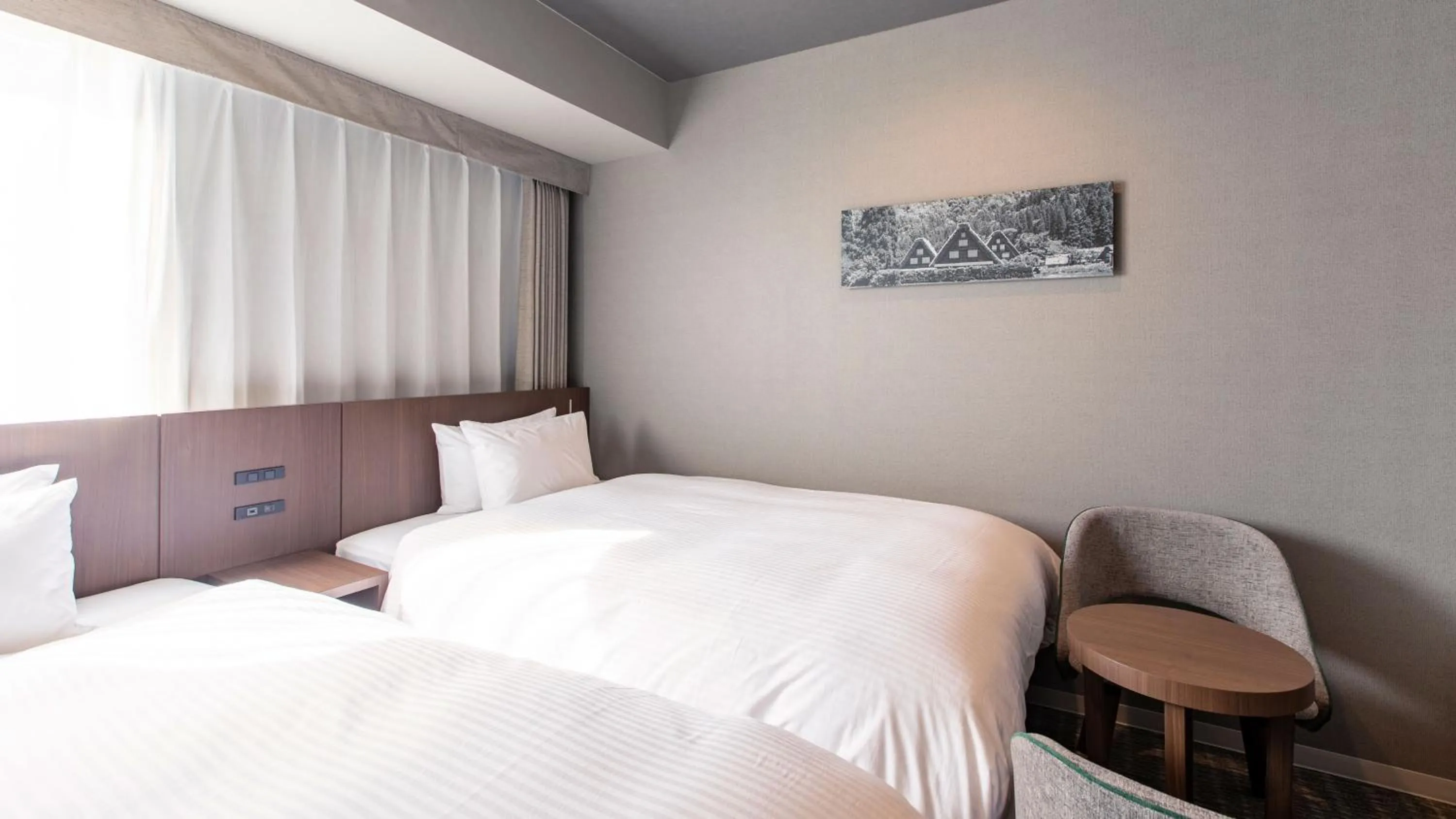 Photo of the whole room, Bed in KOKO HOTEL Hidatakayama - formaly Hotel Wing Hida Takayama