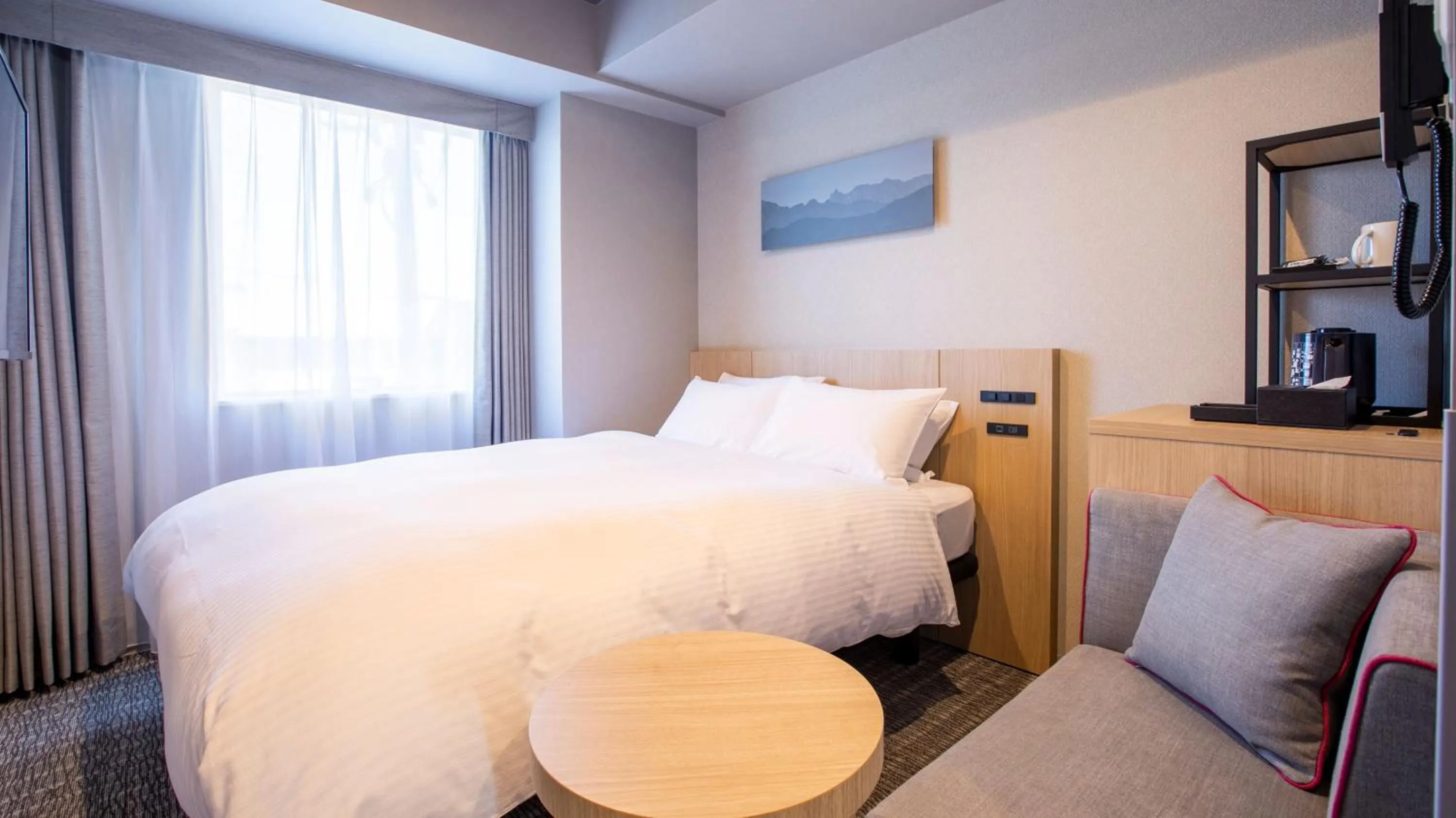 Photo of the whole room, Bed in KOKO HOTEL Hidatakayama - formaly Hotel Wing Hida Takayama