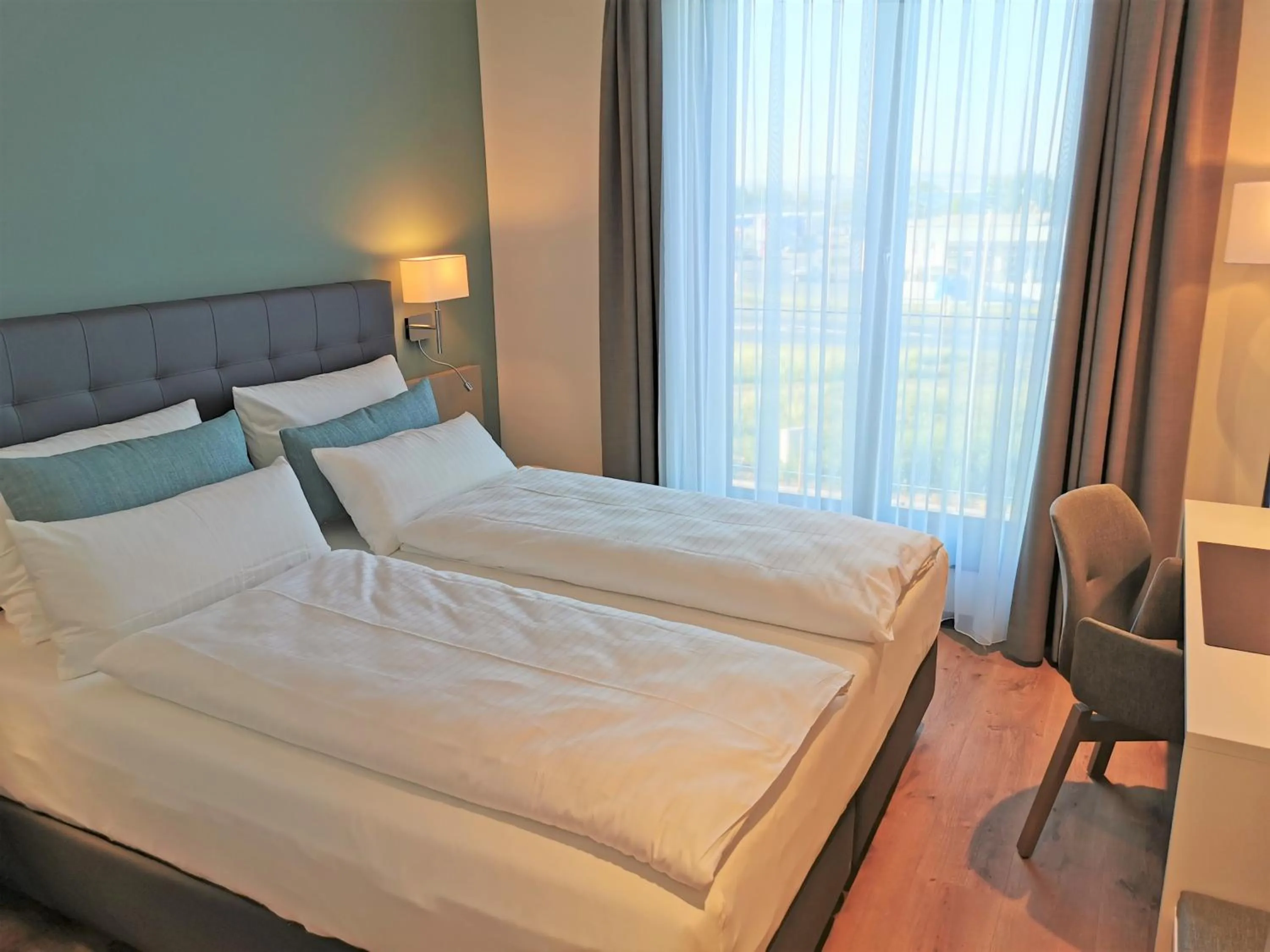 Photo of the whole room, Bed in Zeitlos Boutiquehotel