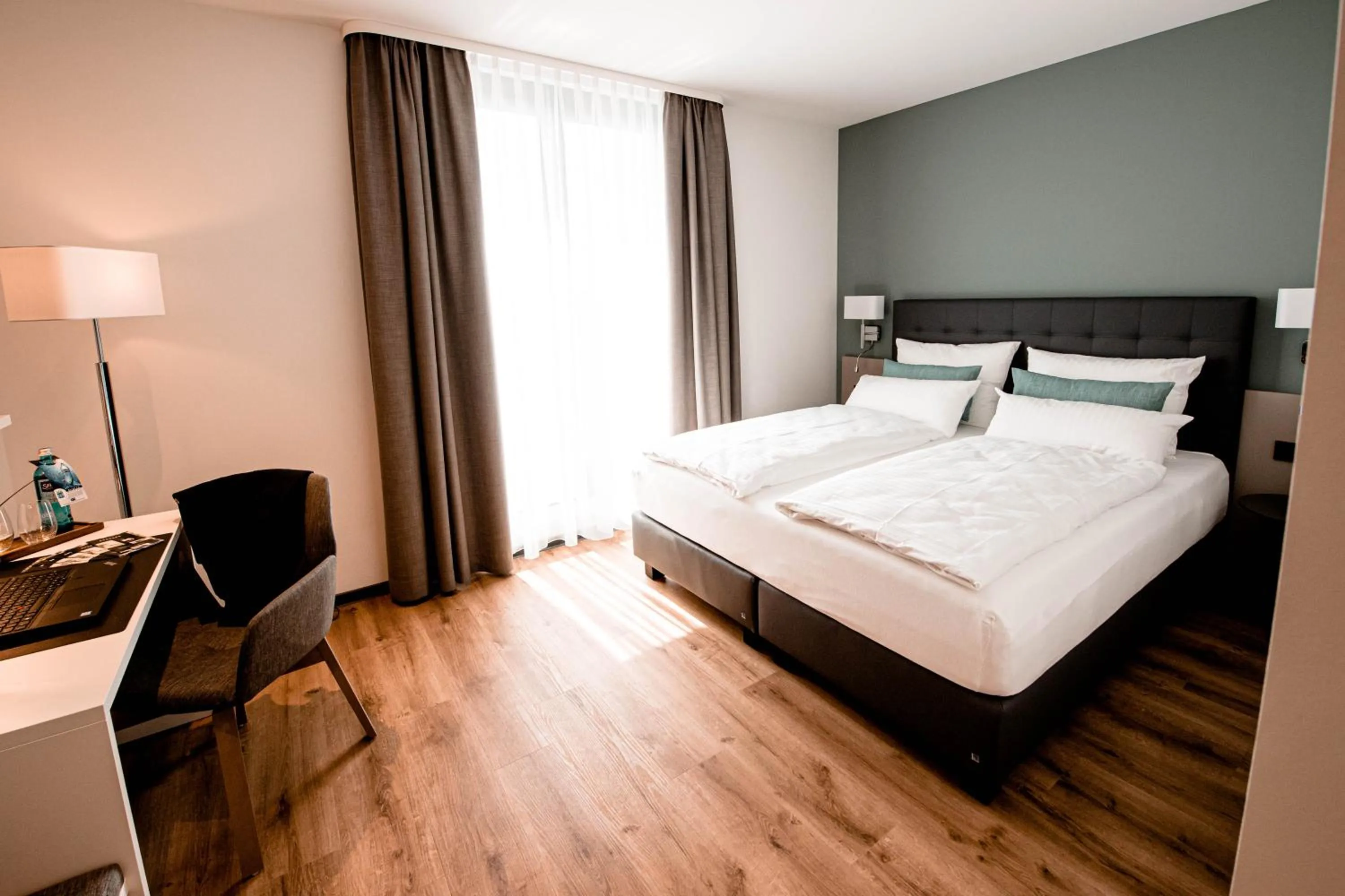 Bed in Zeitlos Boutiquehotel