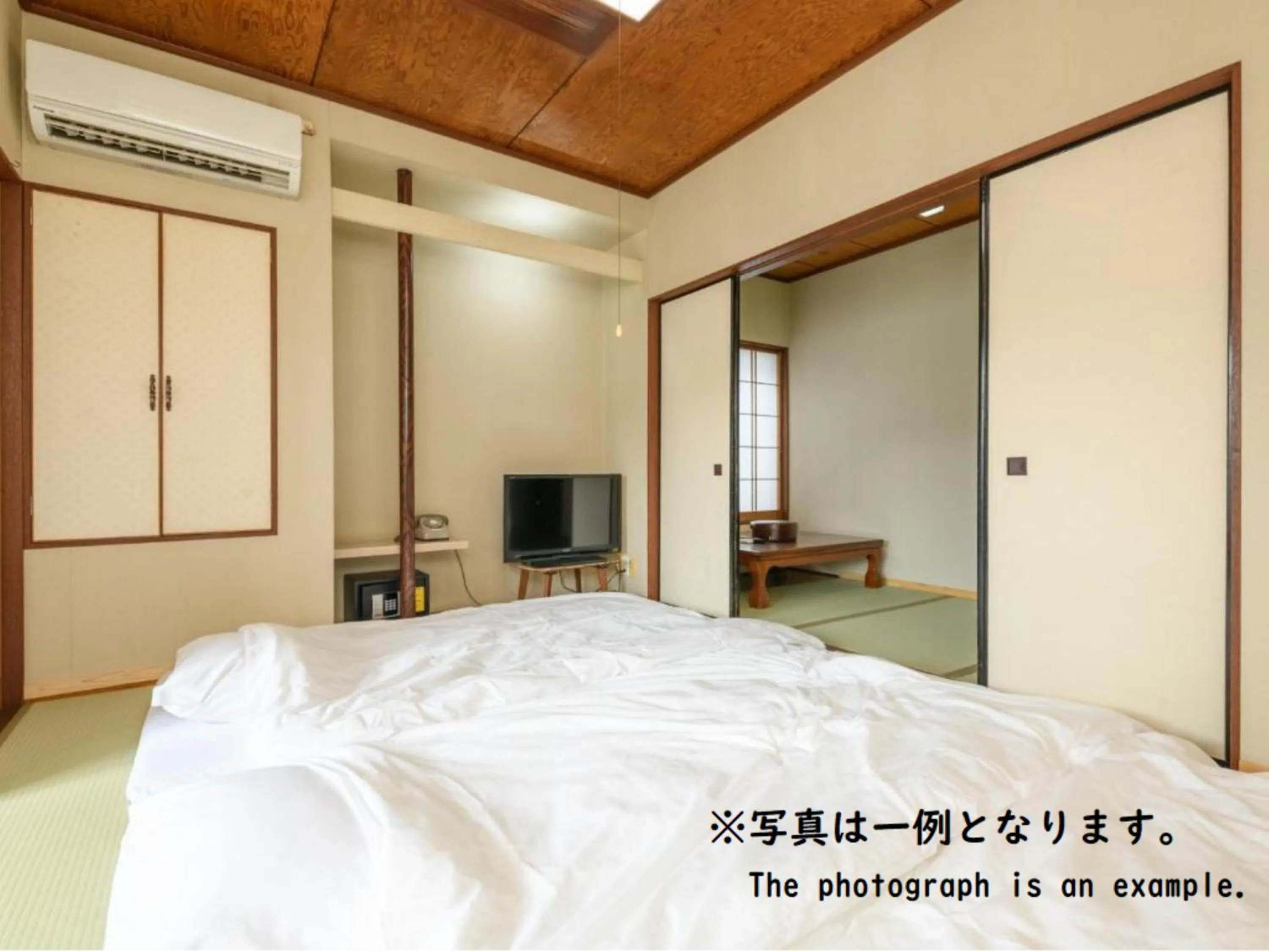 Bed in Tabist Asanokan Annex Iroha Ise