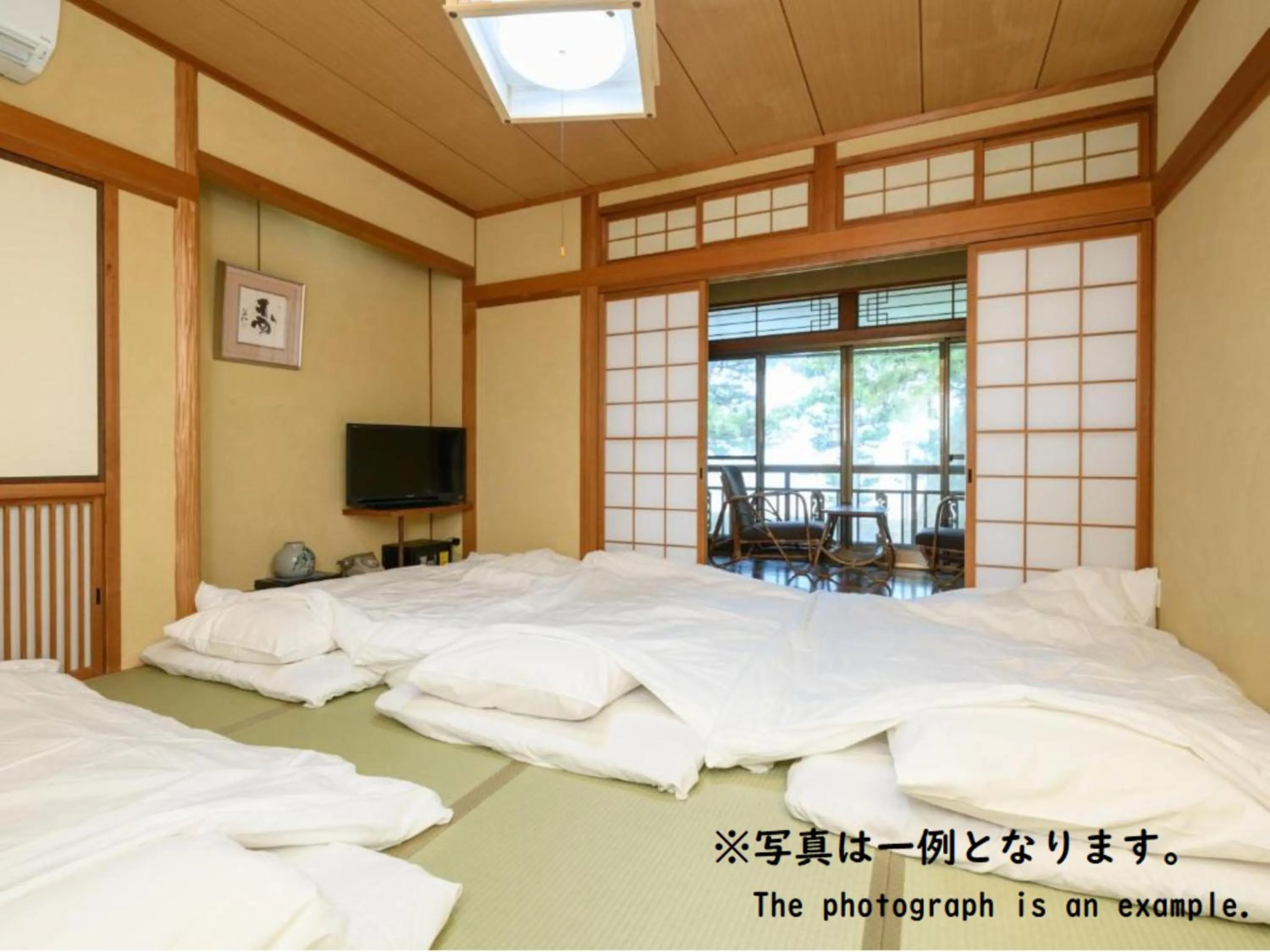 Bed in Tabist Asanokan Annex Iroha Ise