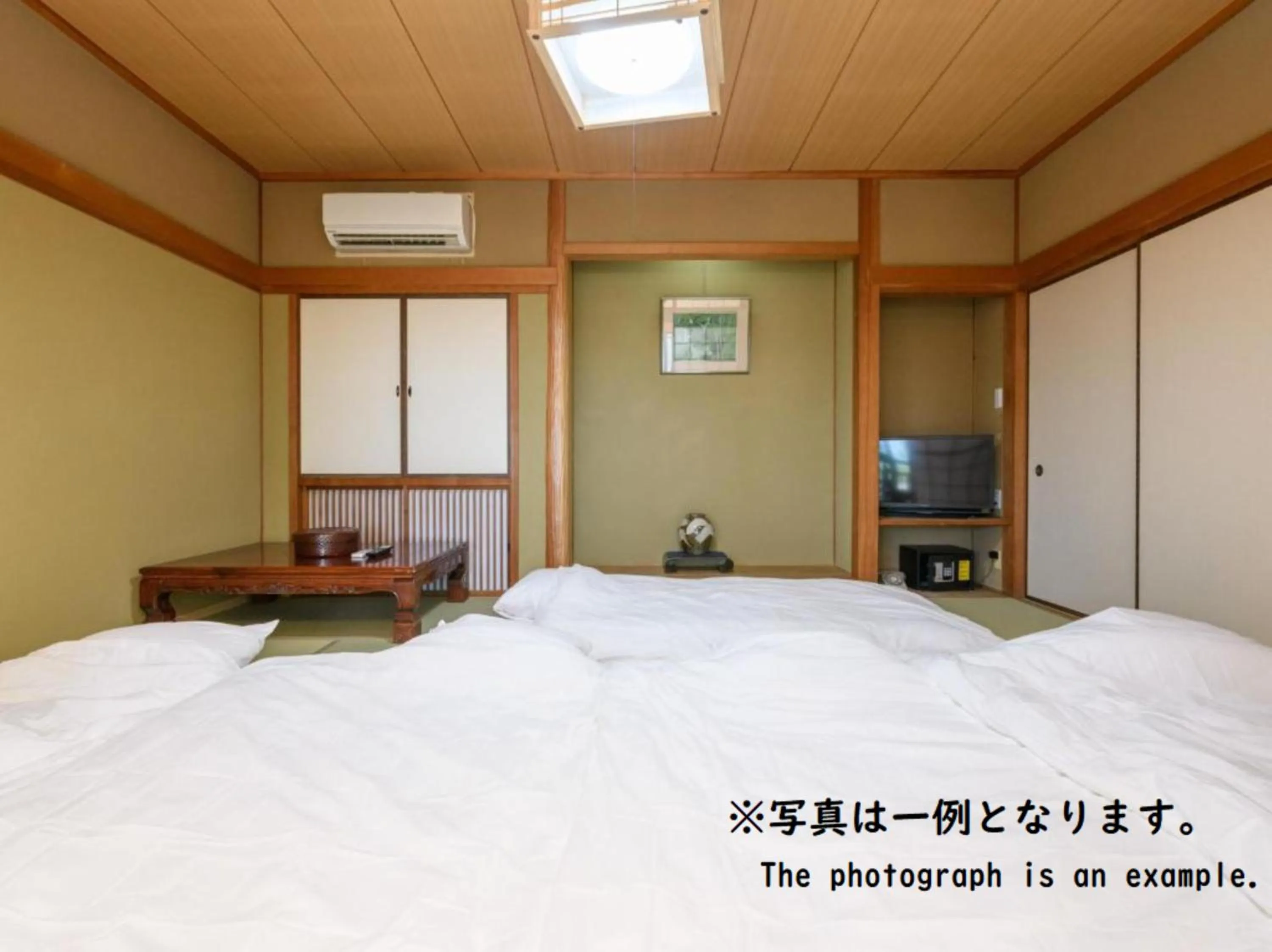 Bed in Tabist Asanokan Annex Iroha Ise