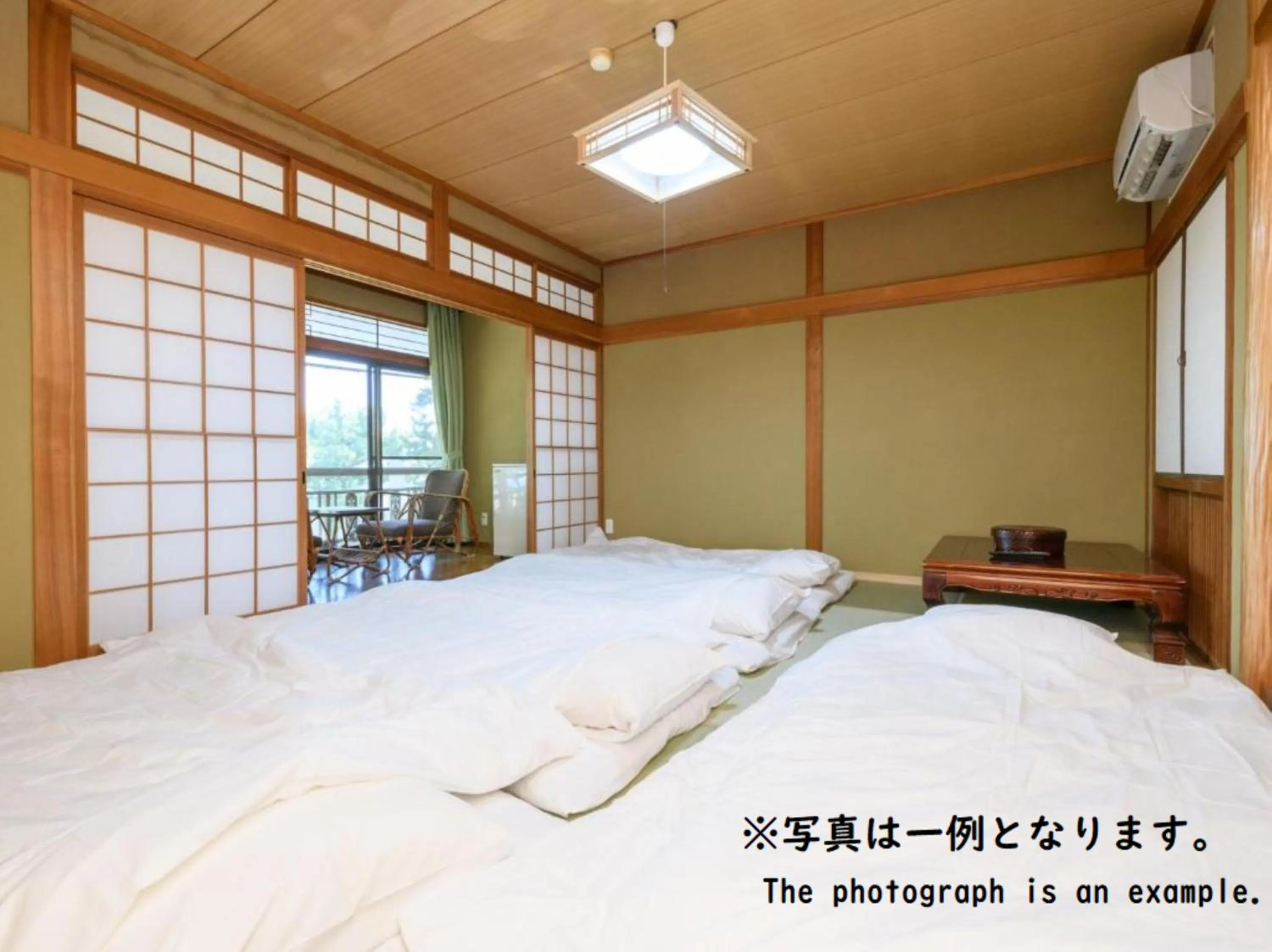 Bed in Tabist Asanokan Annex Iroha Ise