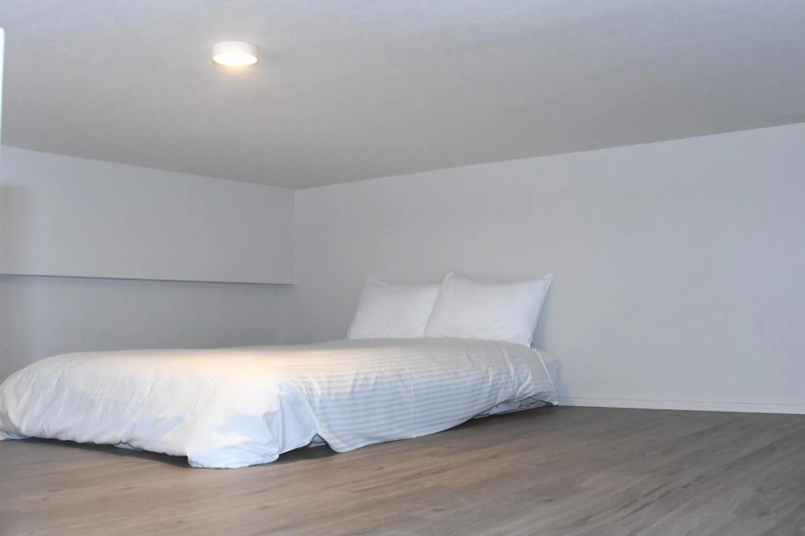 Bed in Hotel Tomas Asahibashi Station