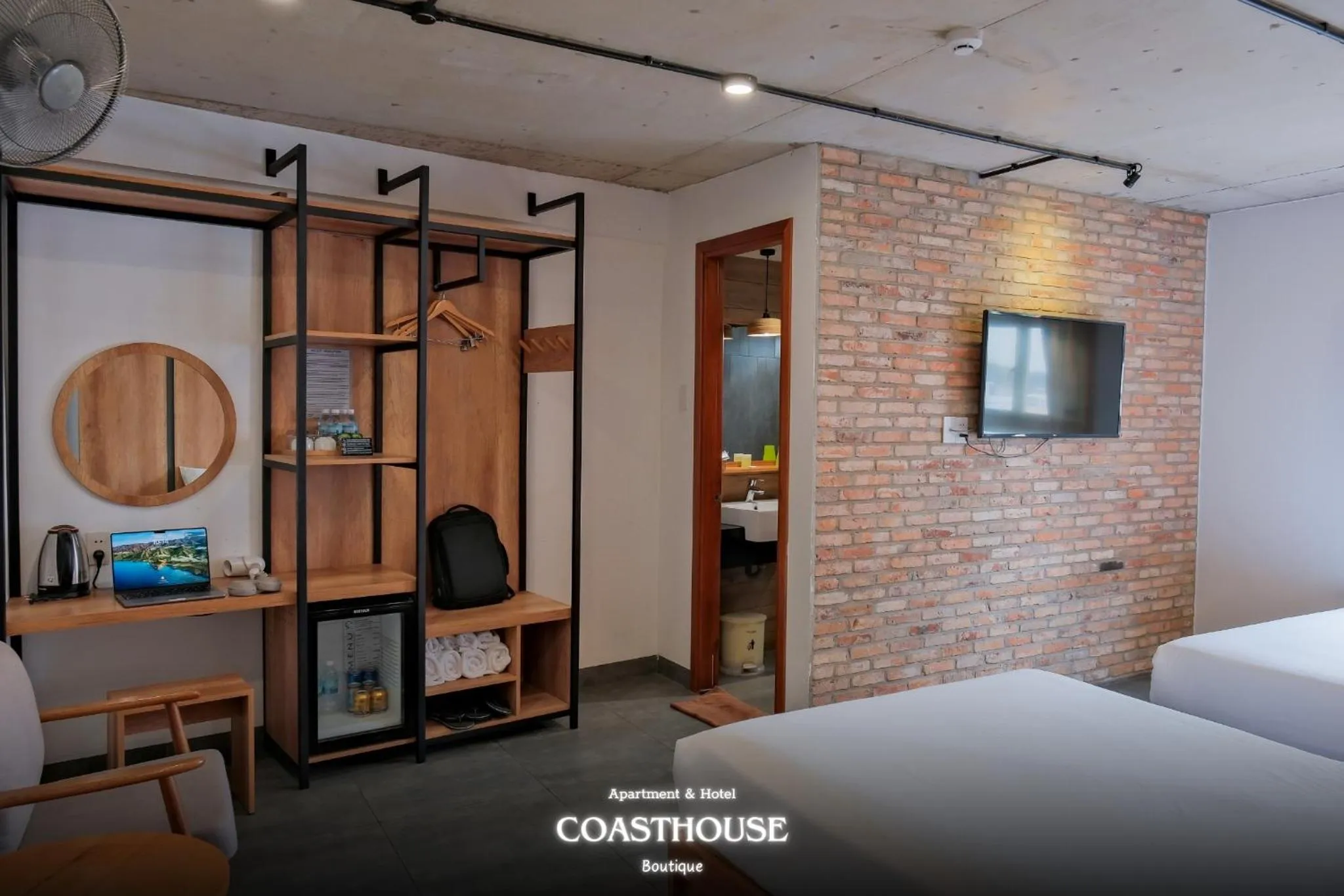 Bed in Coast House Boutique Hotel