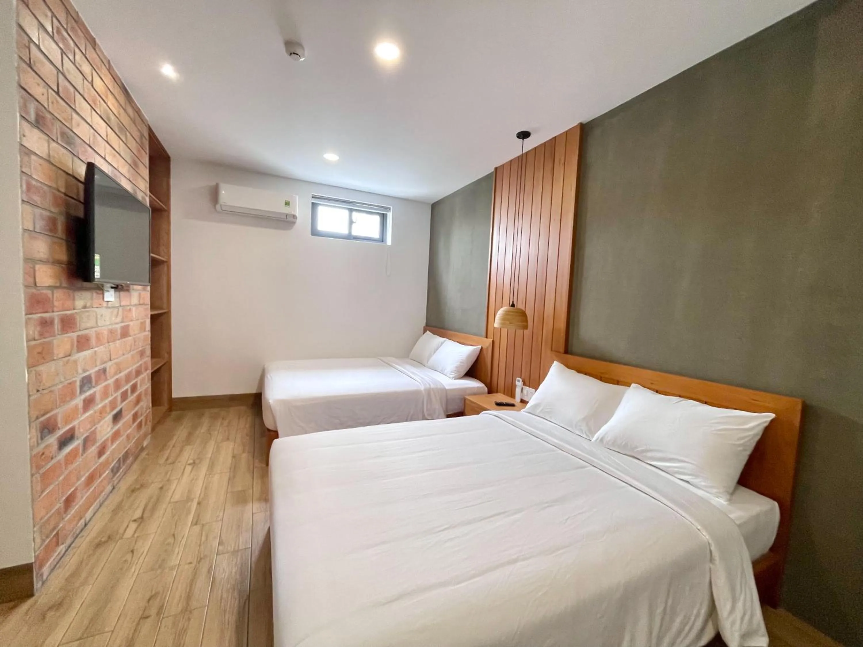 Bed in Coast House Boutique Hotel