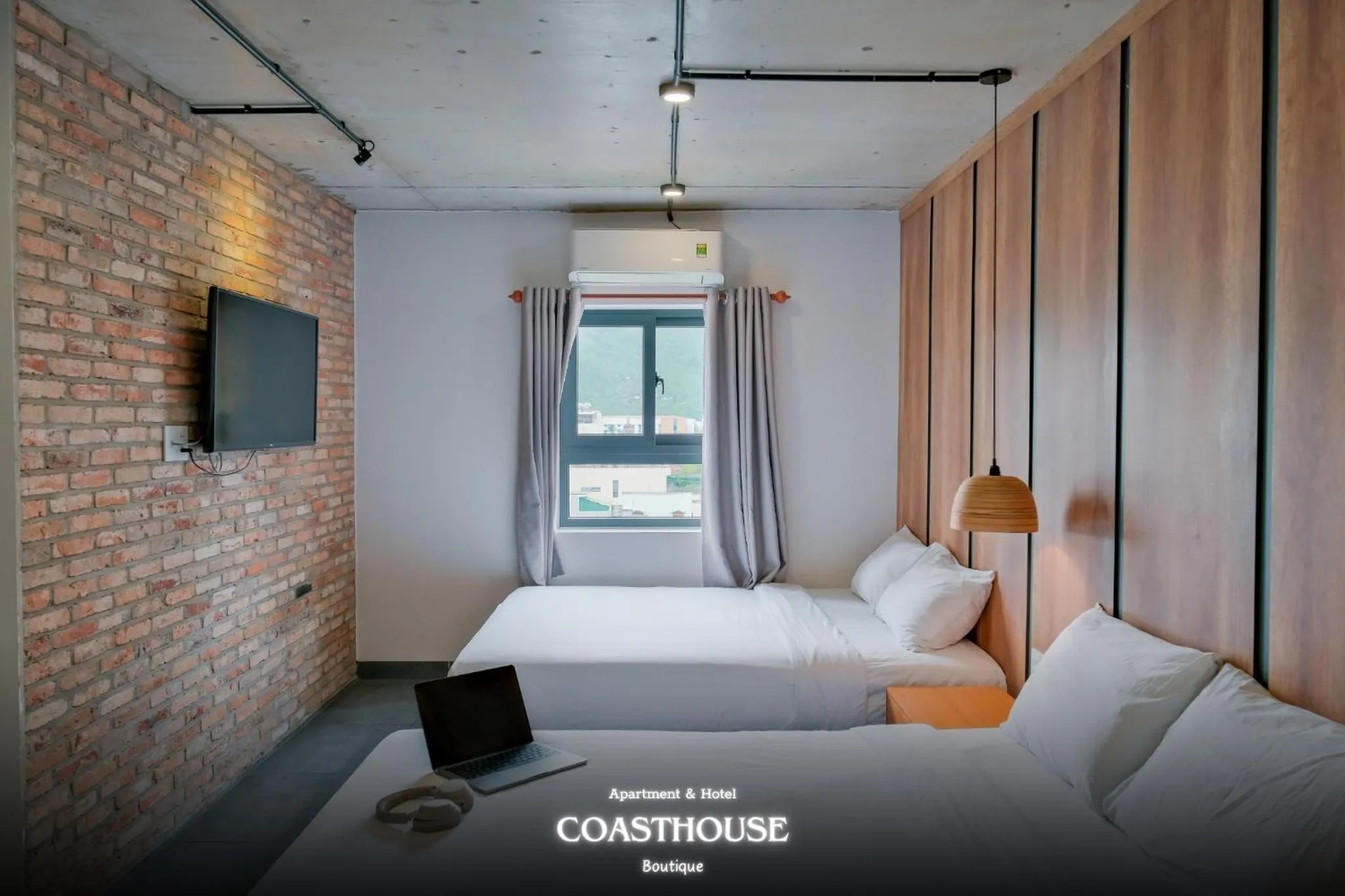 Bed in Coast House Boutique Hotel