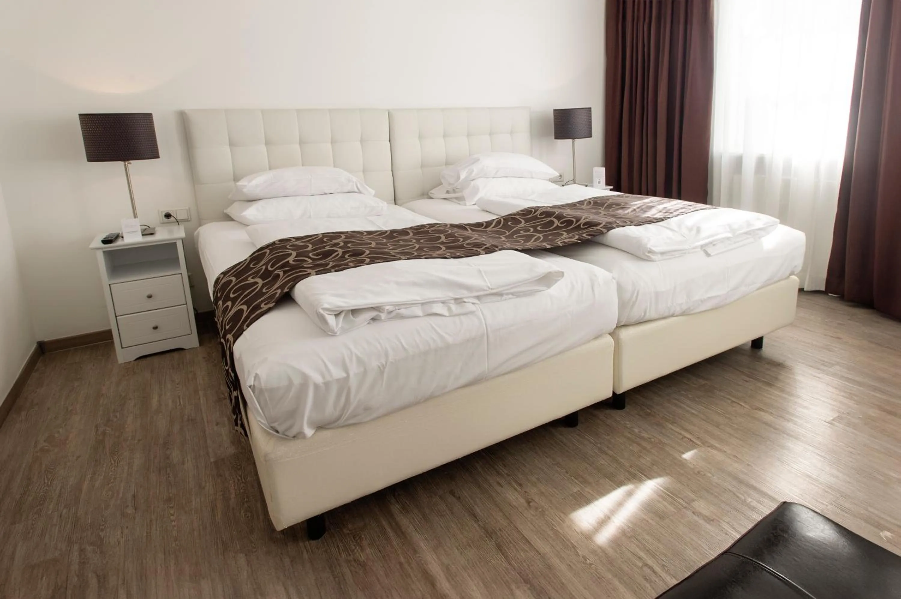 Bed in Werners Boutique Hotel