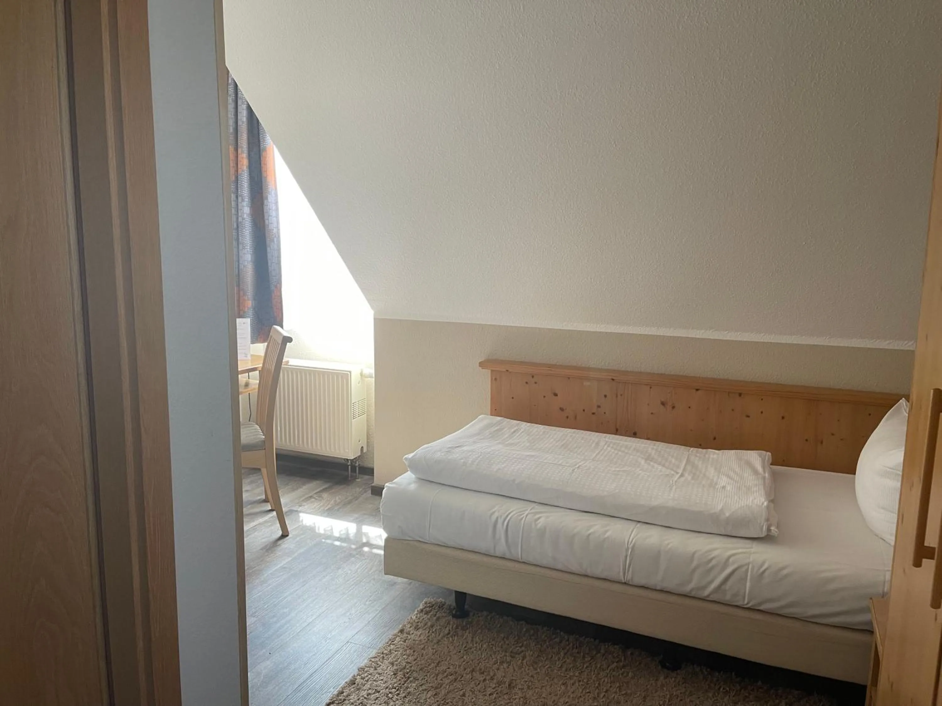 Photo of the whole room, Bed in Hotel Zum Bären