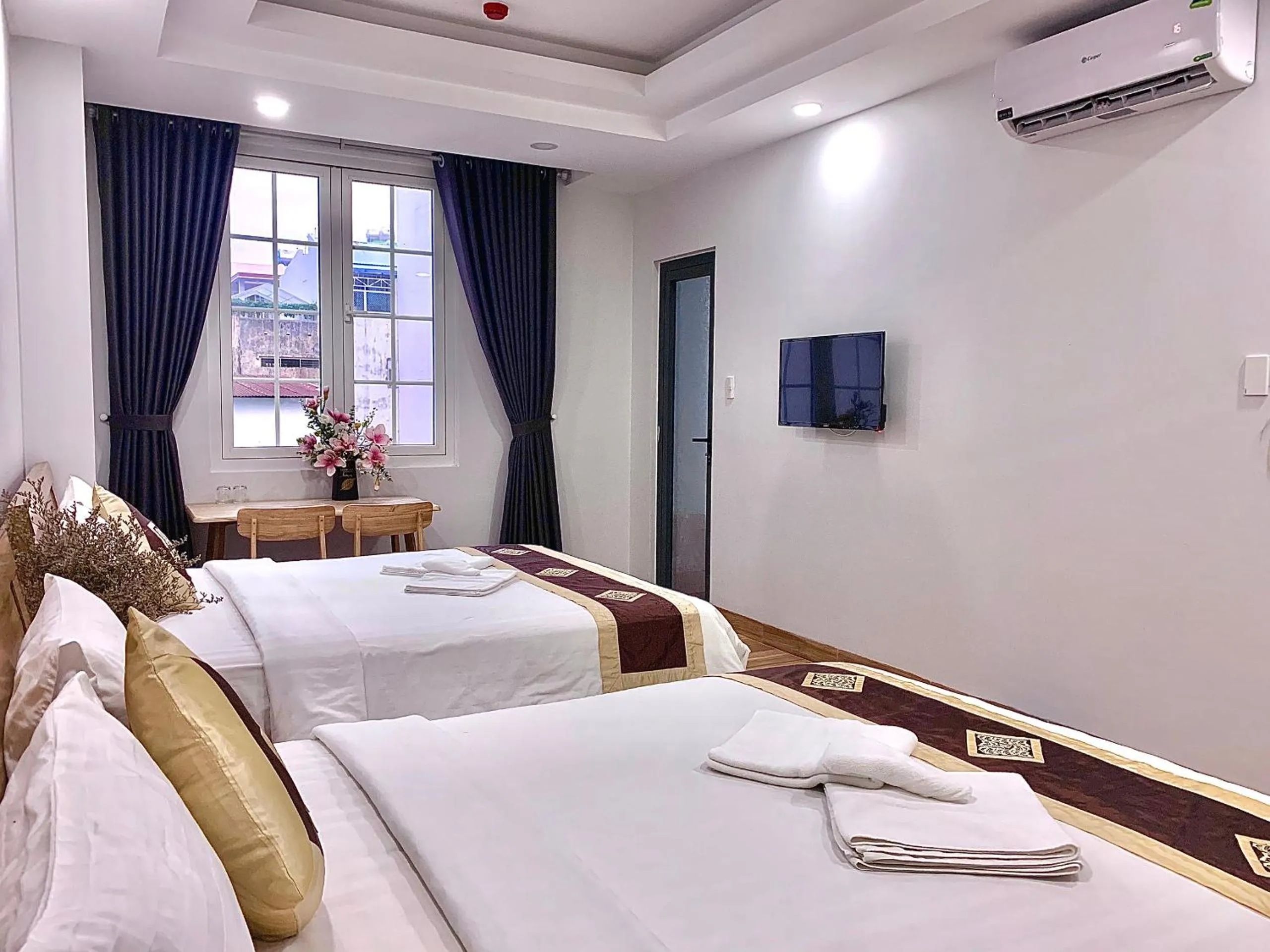 Photo of the whole room, Bed in The Lumiere near Tan Son Nhat Airport