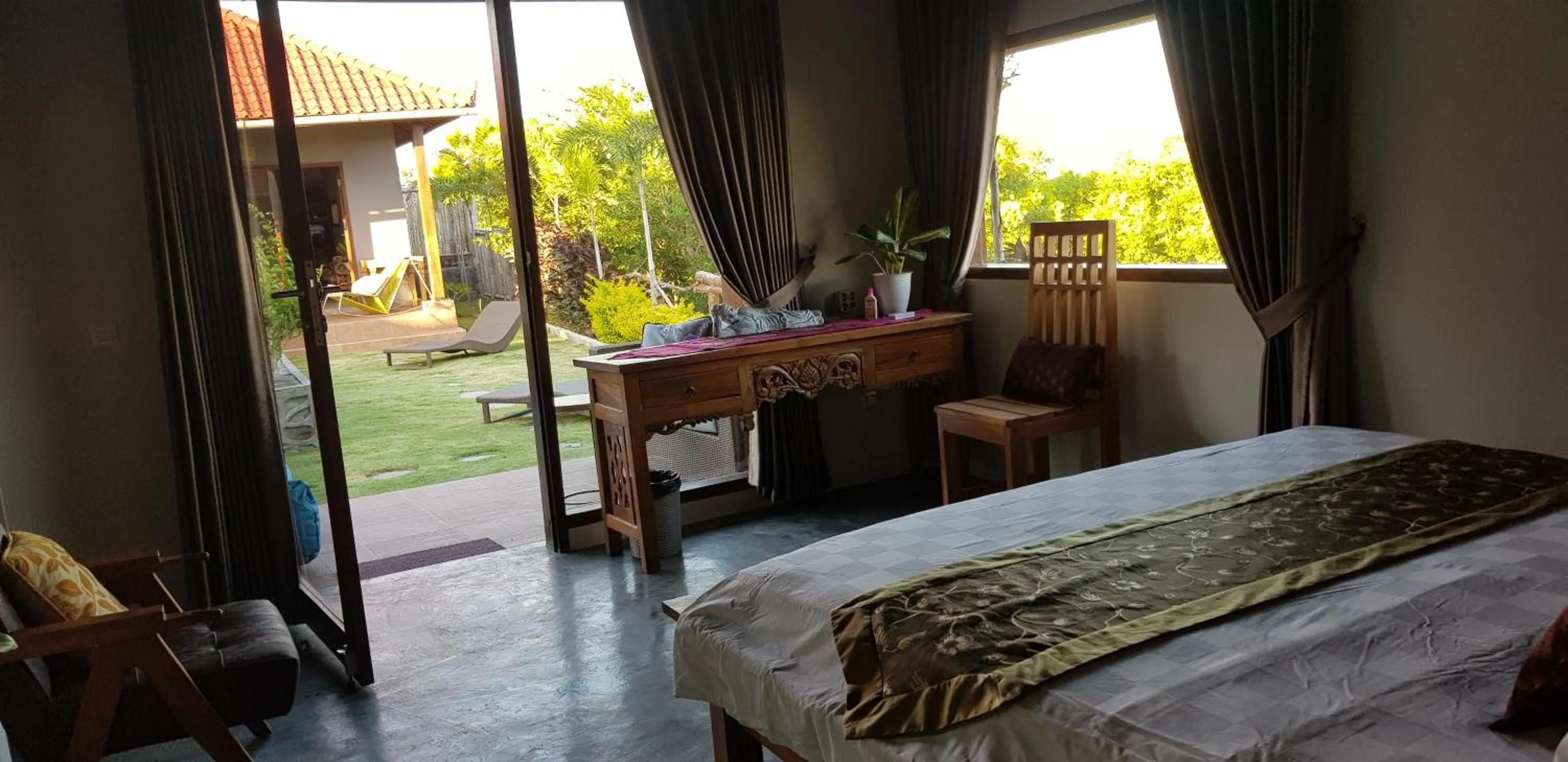 Garden view, Bed in Ombak Resort at Ekas , a luxury surf and kite destination, Close to Inside Ekas beach