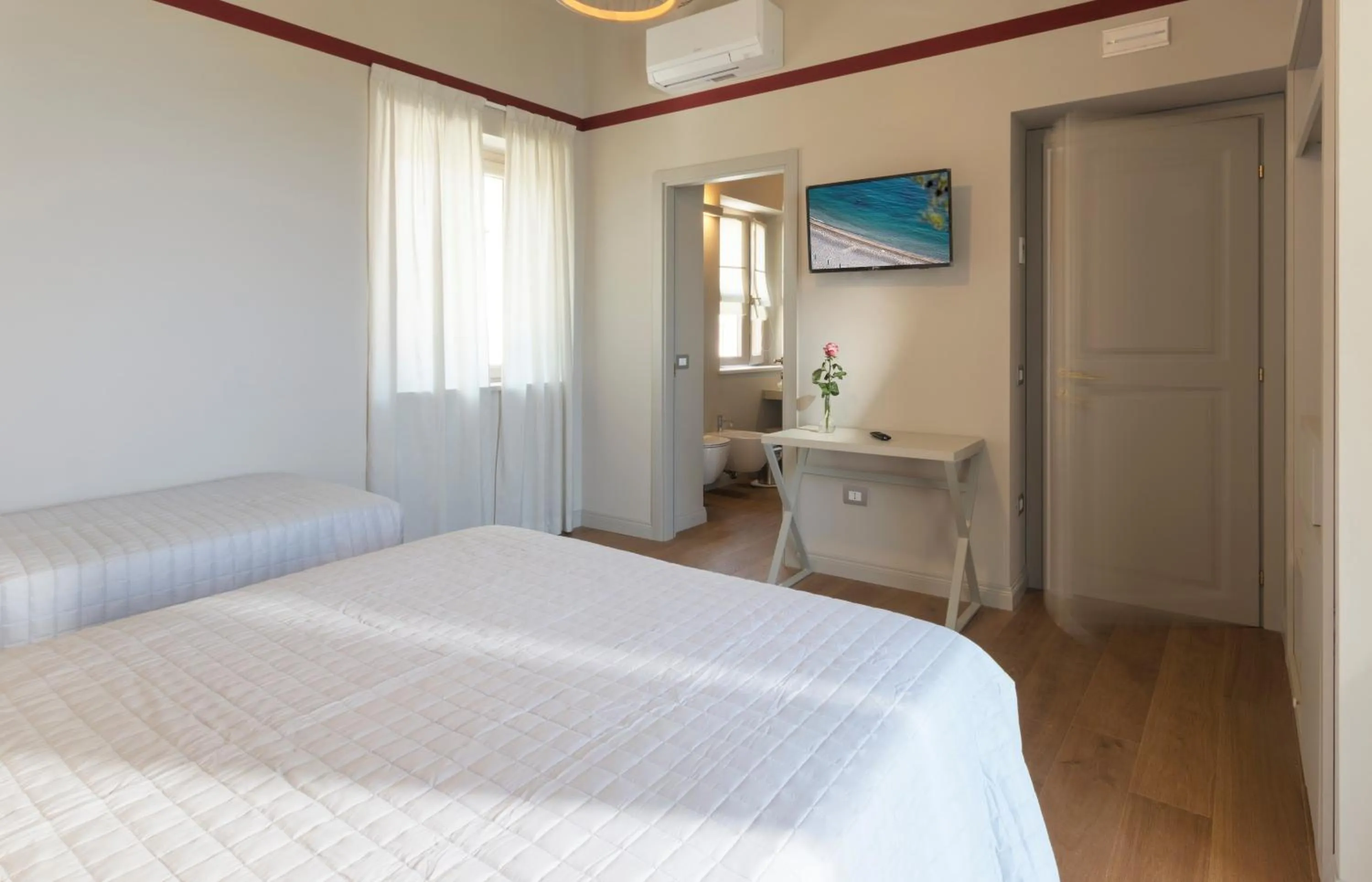 Bed in Diecidodici BoutiqueRooms