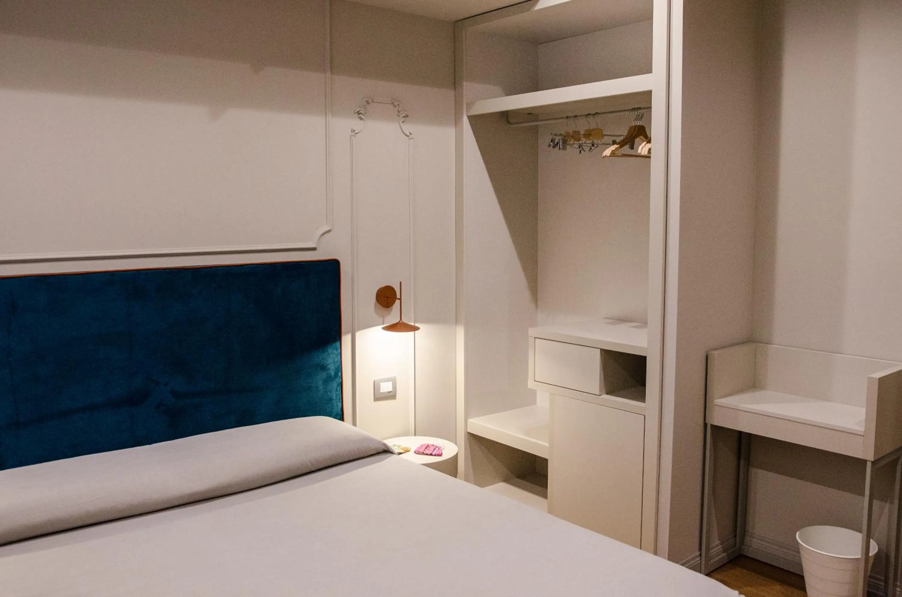 Bed in Diecidodici BoutiqueRooms