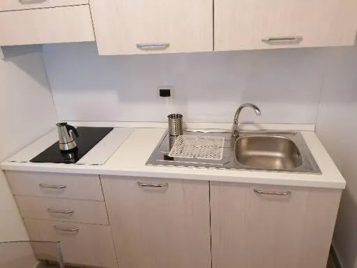Kitchen or kitchenette in Zibibbo Beach Apartments - Trapani