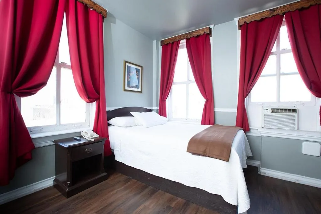 Bed in The Rialto Hotel