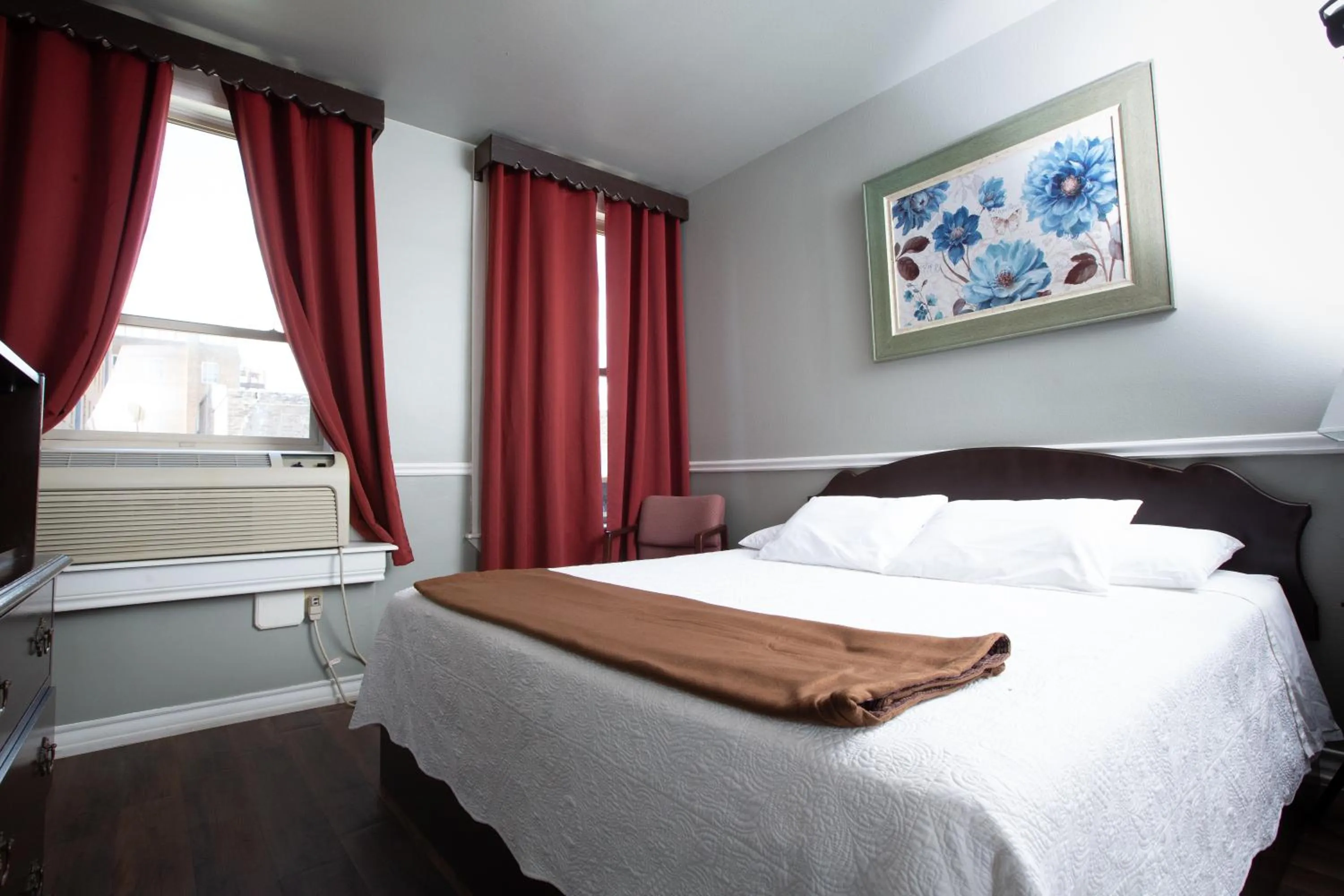 Bed in The Rialto Hotel