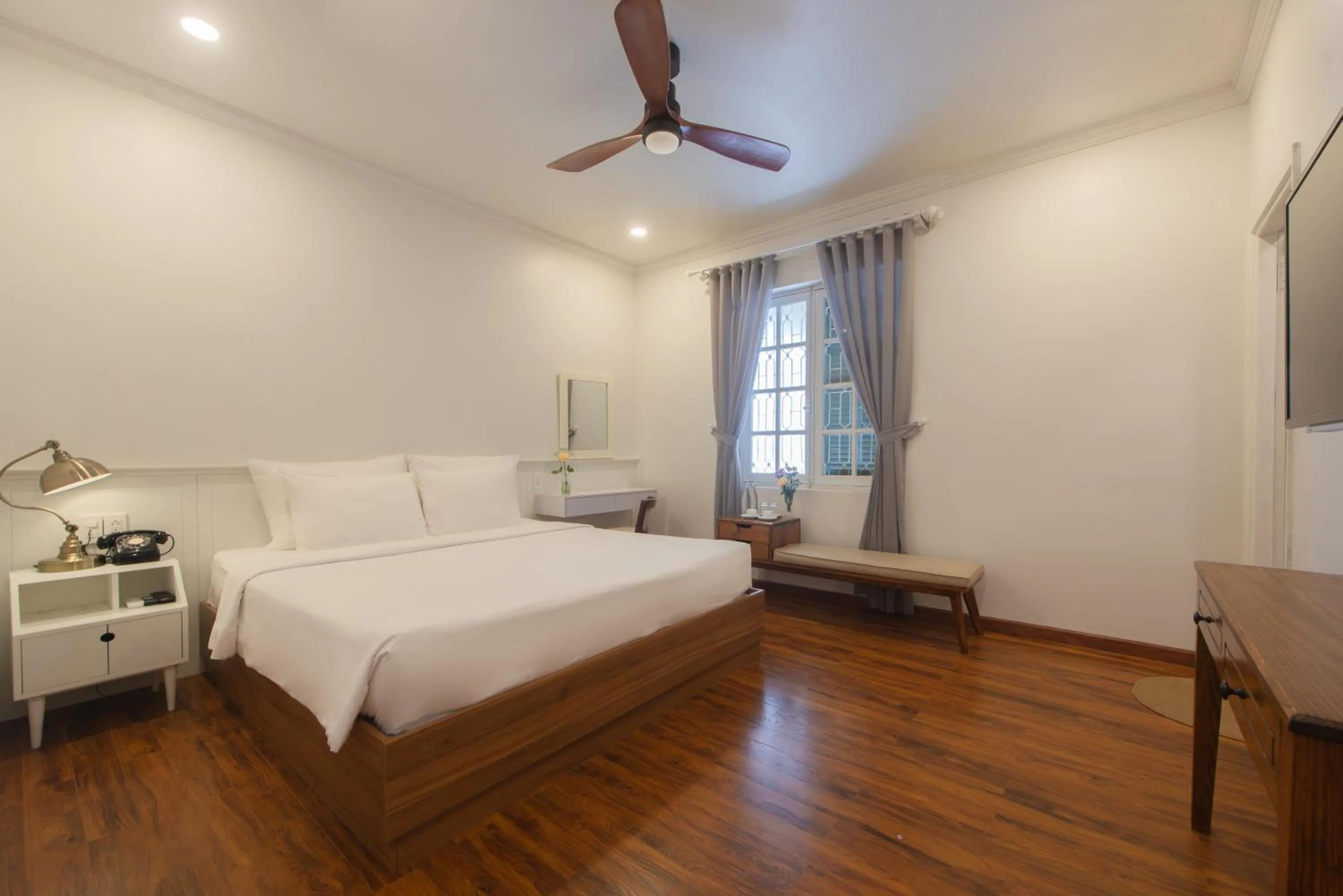 Bed in Le Soleil Boutique Hotel