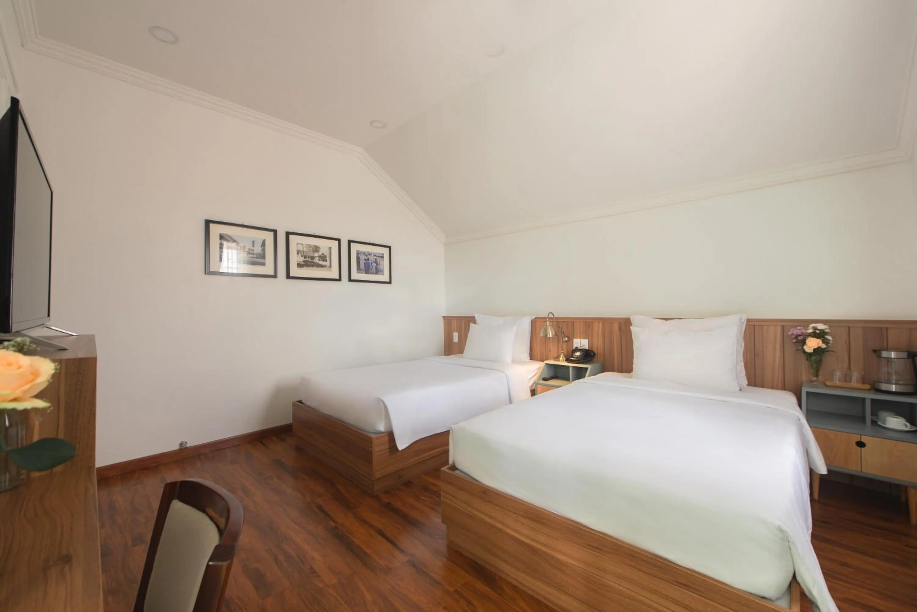 Bed in Le Soleil Boutique Hotel